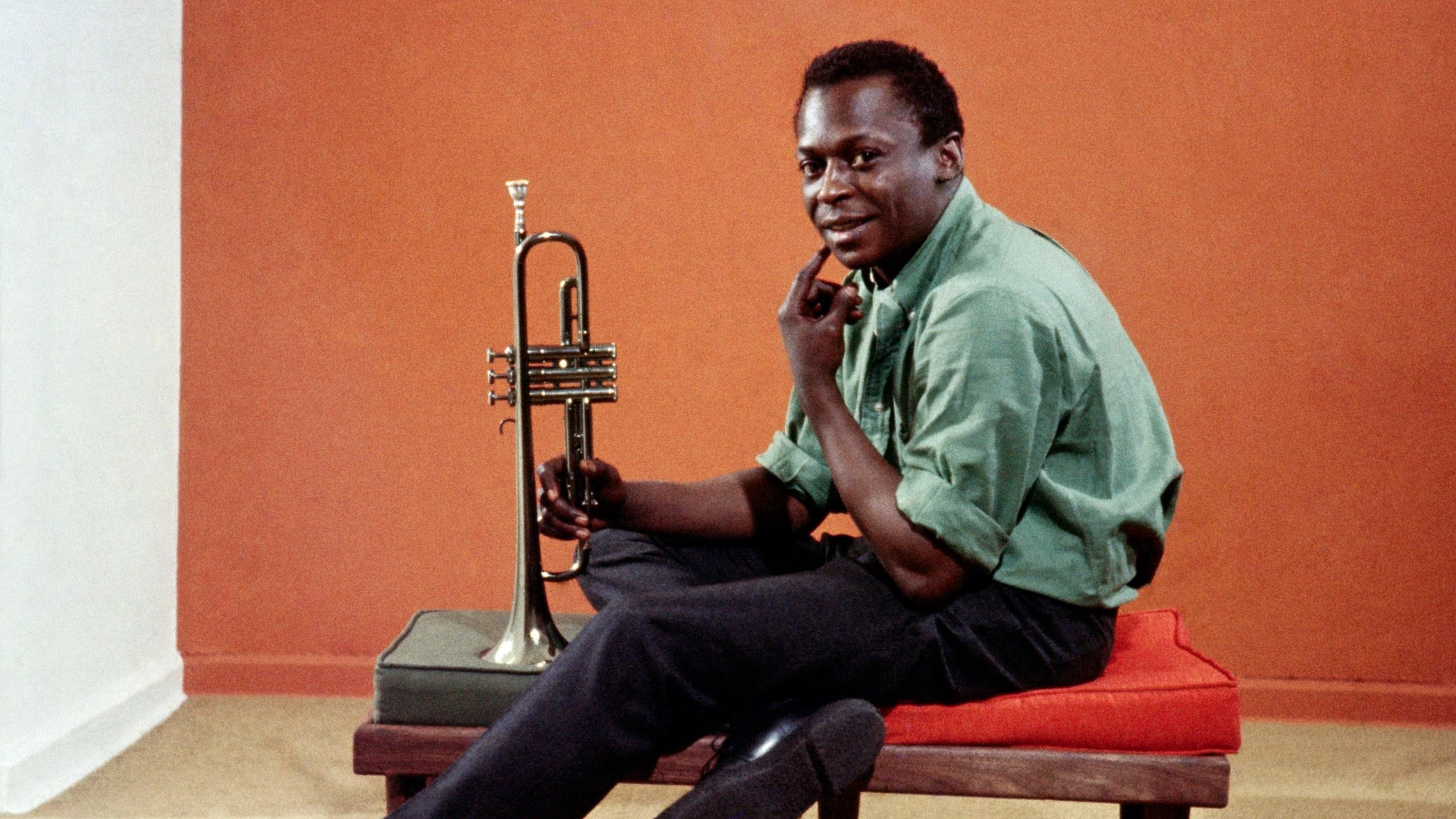Miles Davis wearing a green OCBD on the cover of Milestones