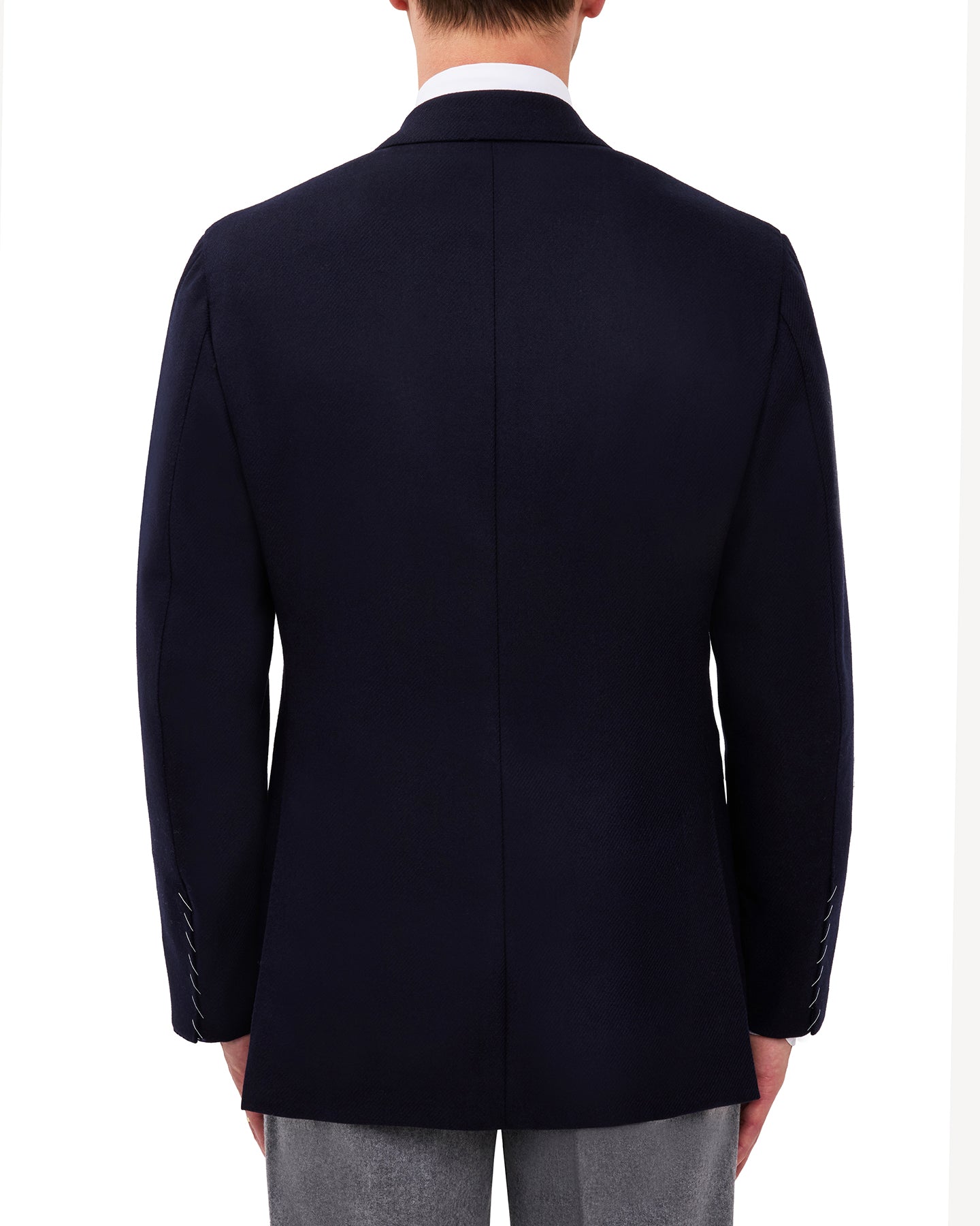 Man wearing navy flannel double breasted sport coat