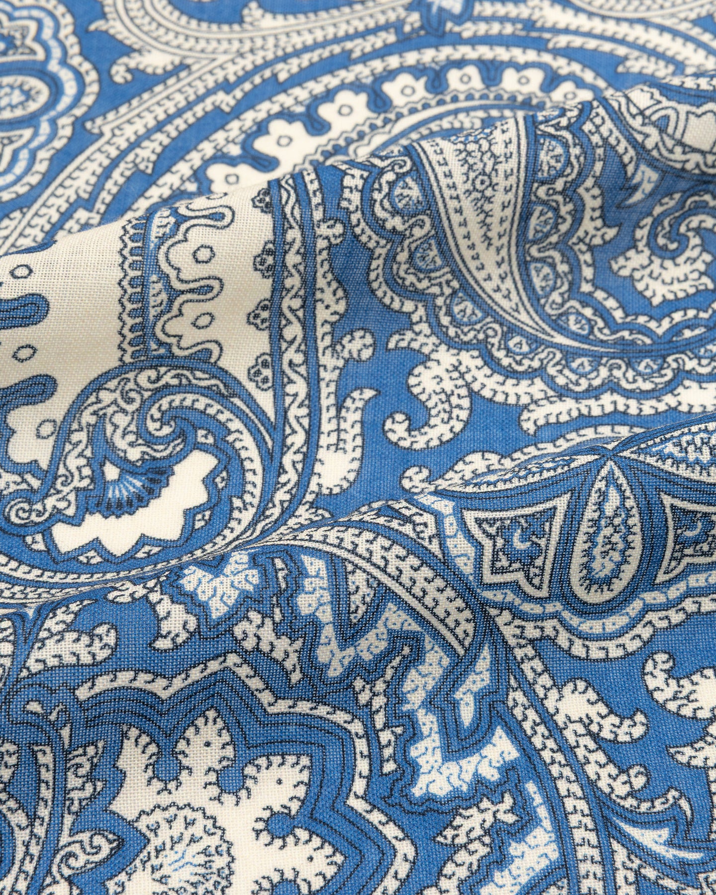 Light blue, ecru and navy paisley wool silk fabric