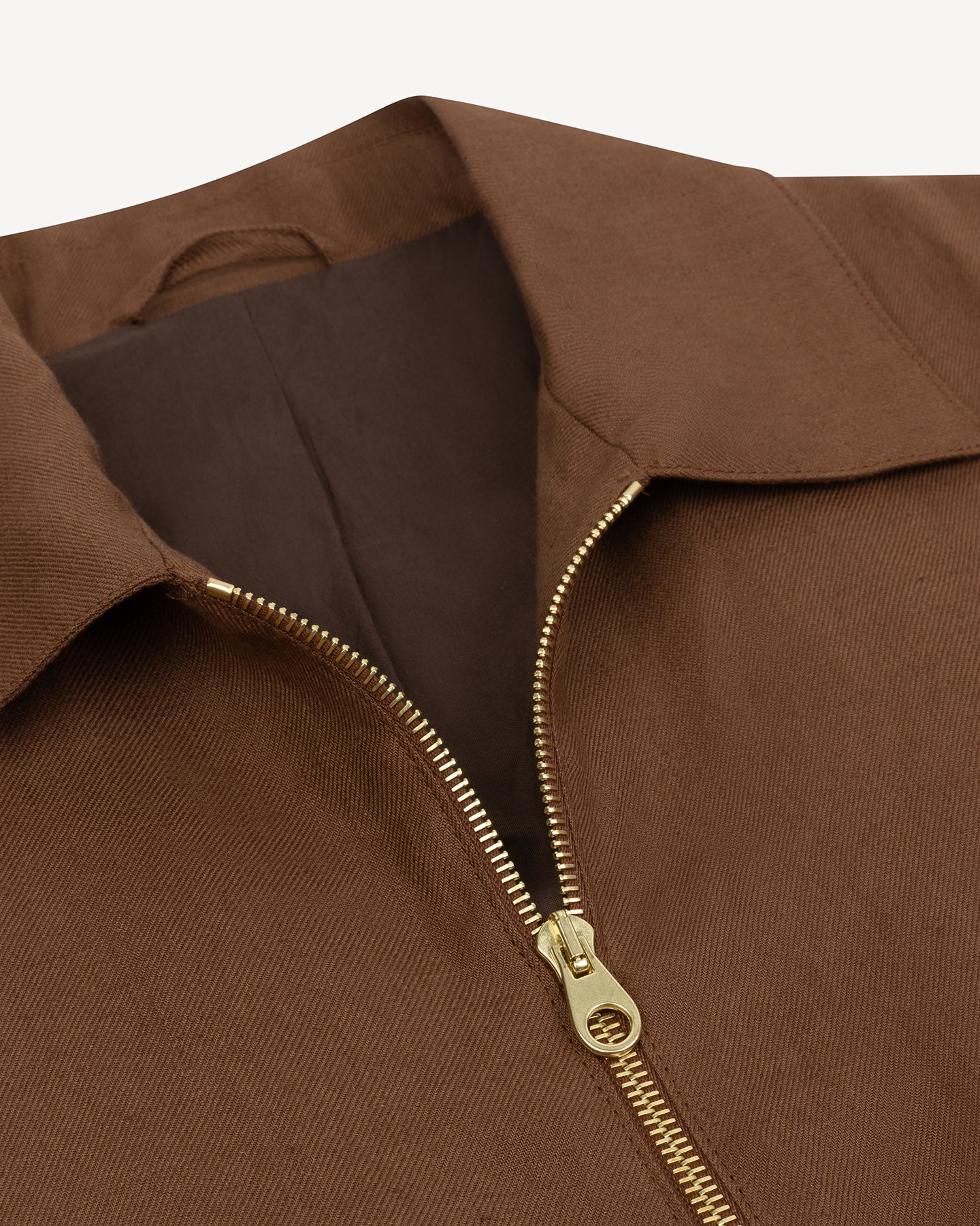 Dark tan bomber jacket with brass zipper