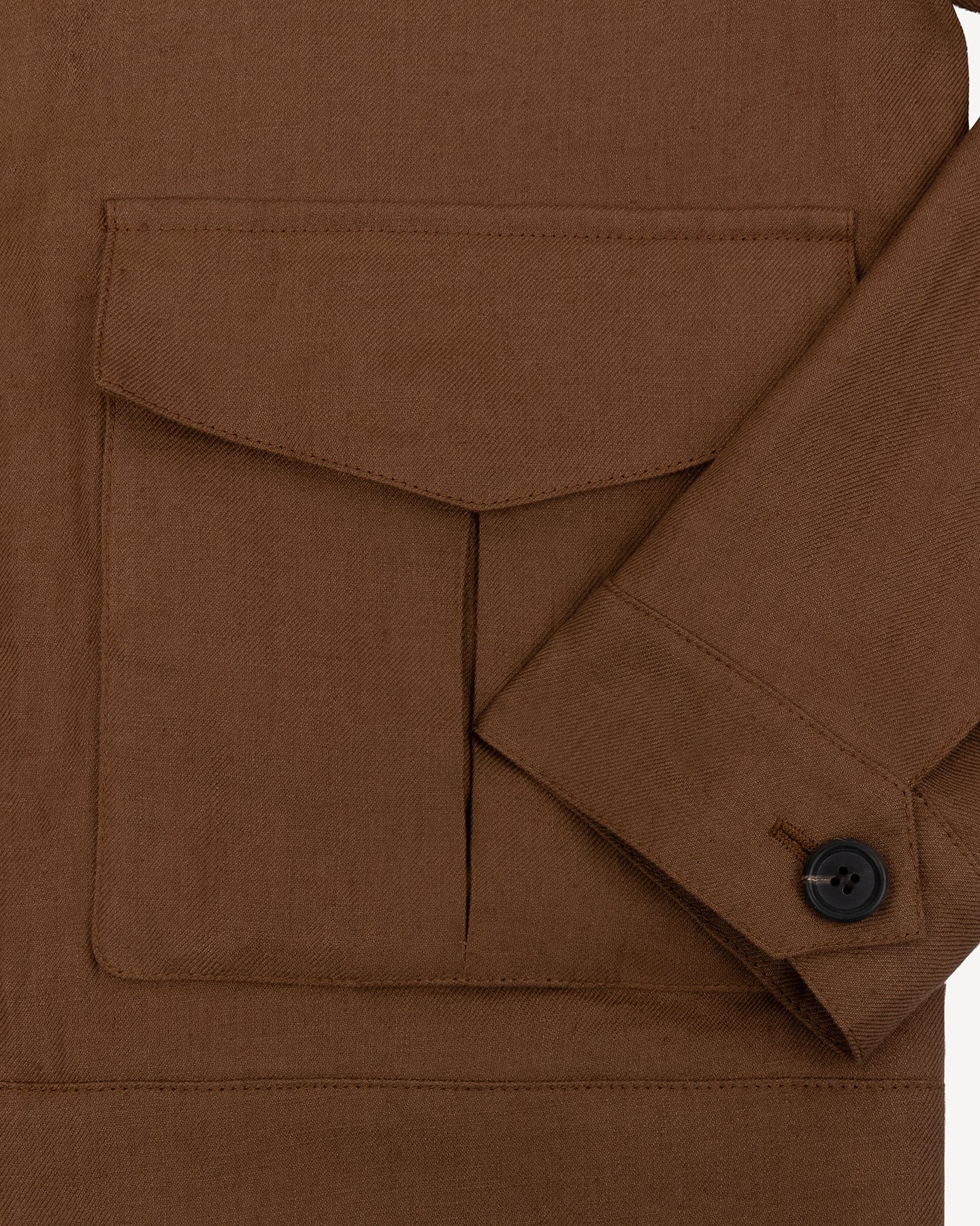 Oversized pockets on dark tan flight jacket