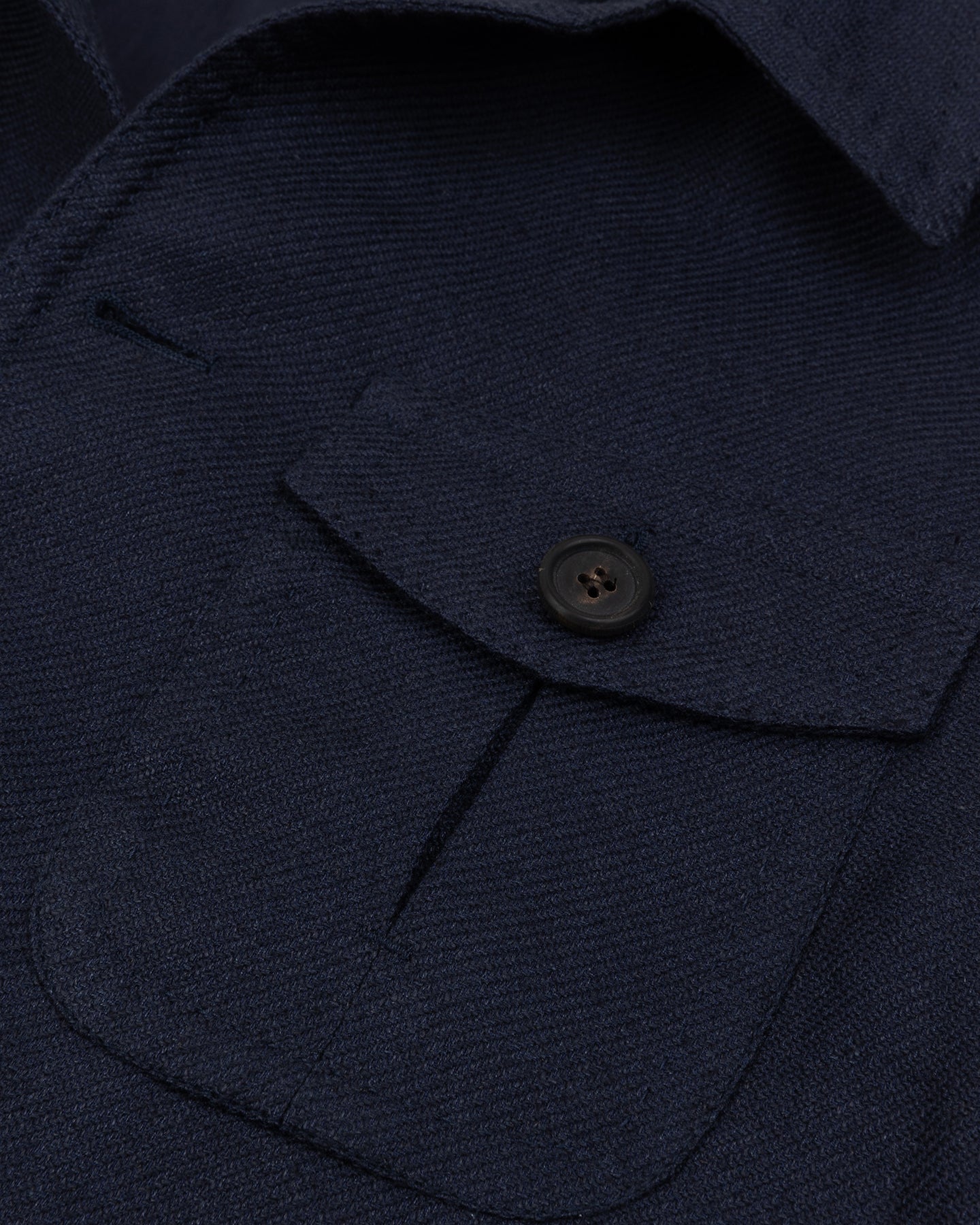 Navy jacket with chest pocket and horn butons