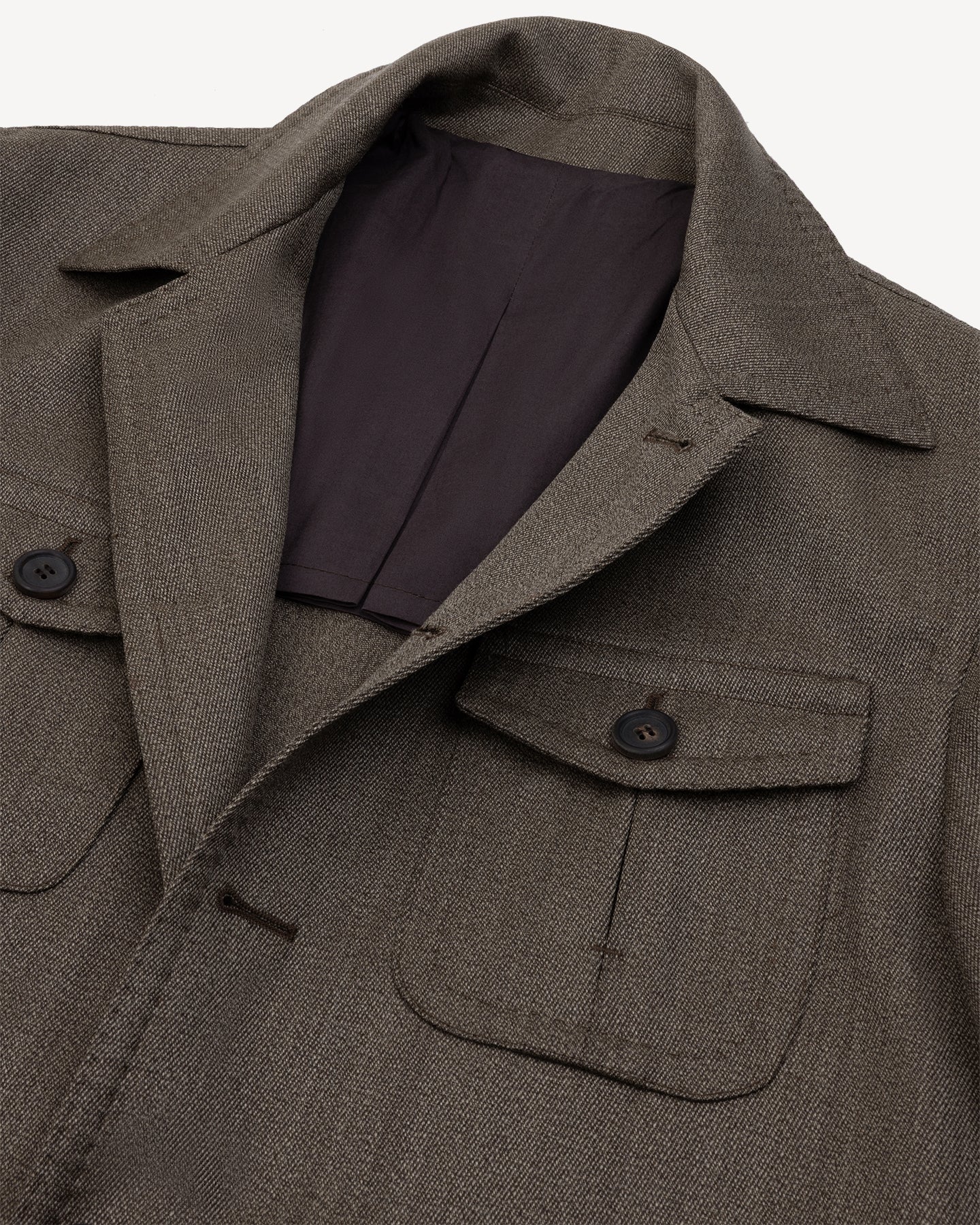 Brown safari jacket with lapel collar roll