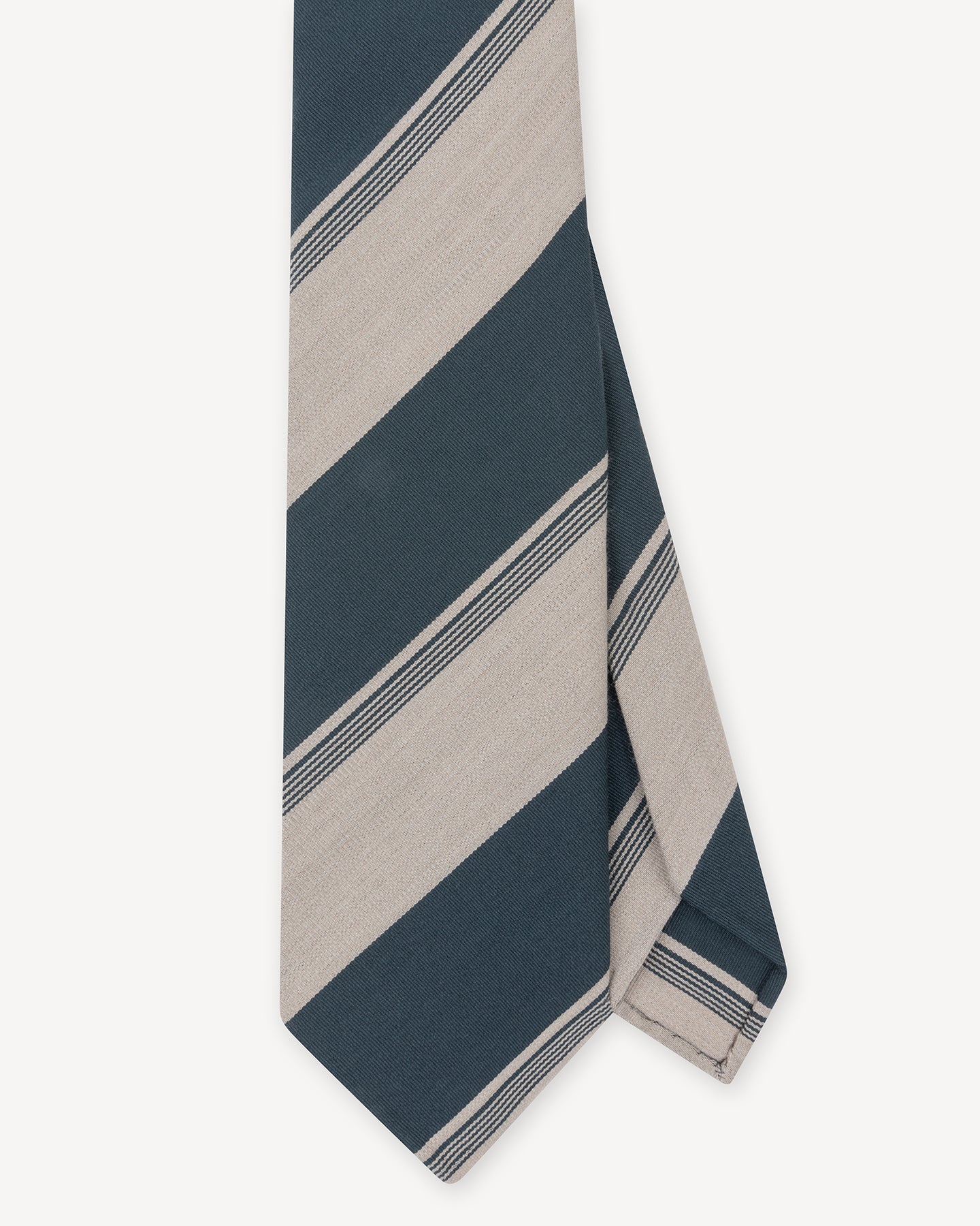 Top view of a petrol and beige stripe wool cotton tie