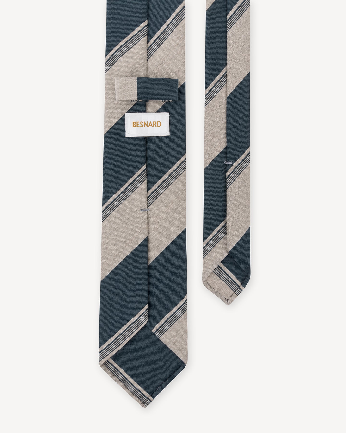 A petrol and beige stripe wool cotton tie with hand rolled blades