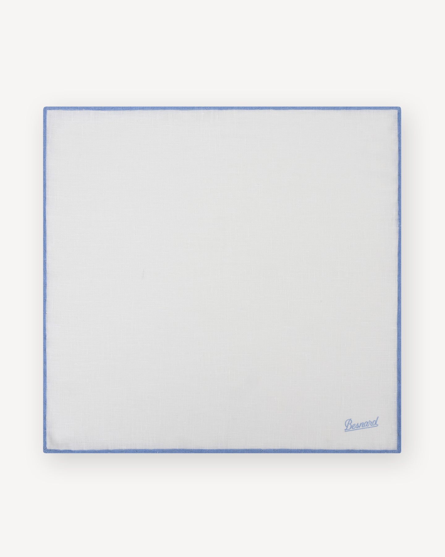White linen pocket square with light blue shoestring border