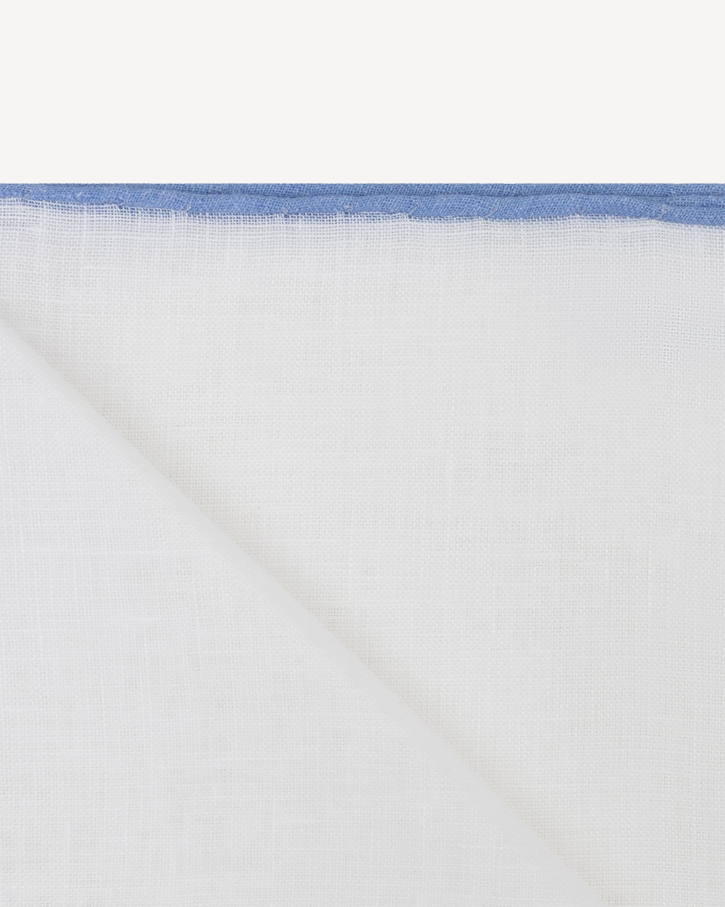 White handrolled linen pocket square with light blue shoestring border