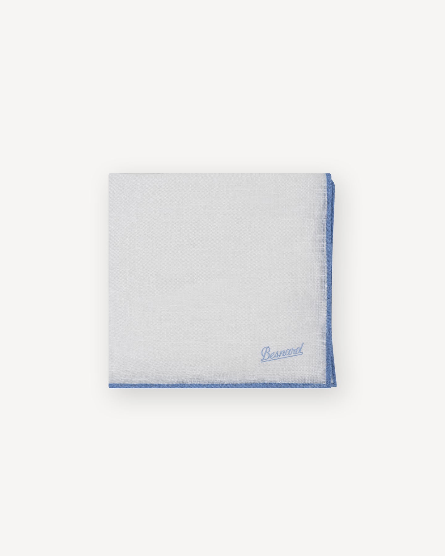 White linen pocket square with light blue shoestring border