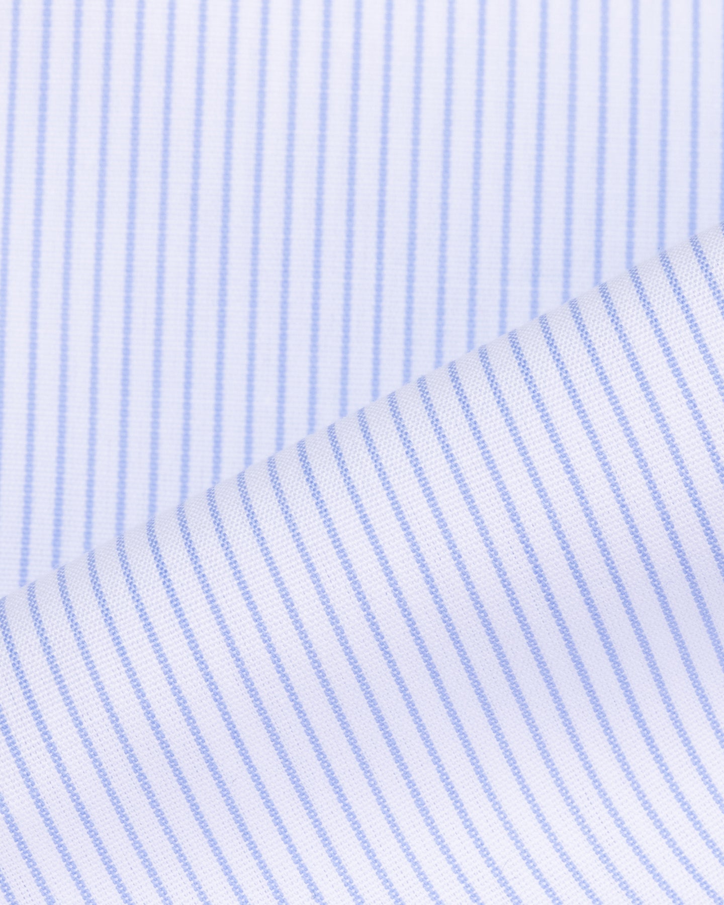 A light blue poplin shirt fabric with light blue hairline stripe