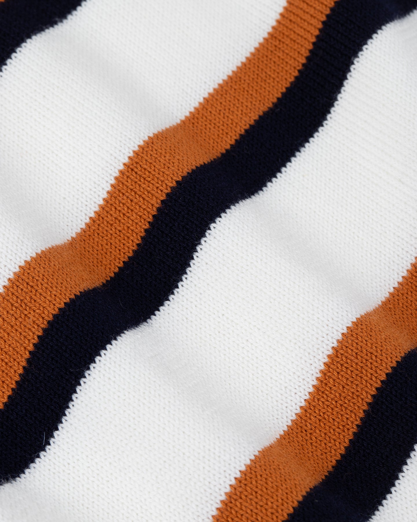 Fine gauge organic cotton with white caramel navy stripe