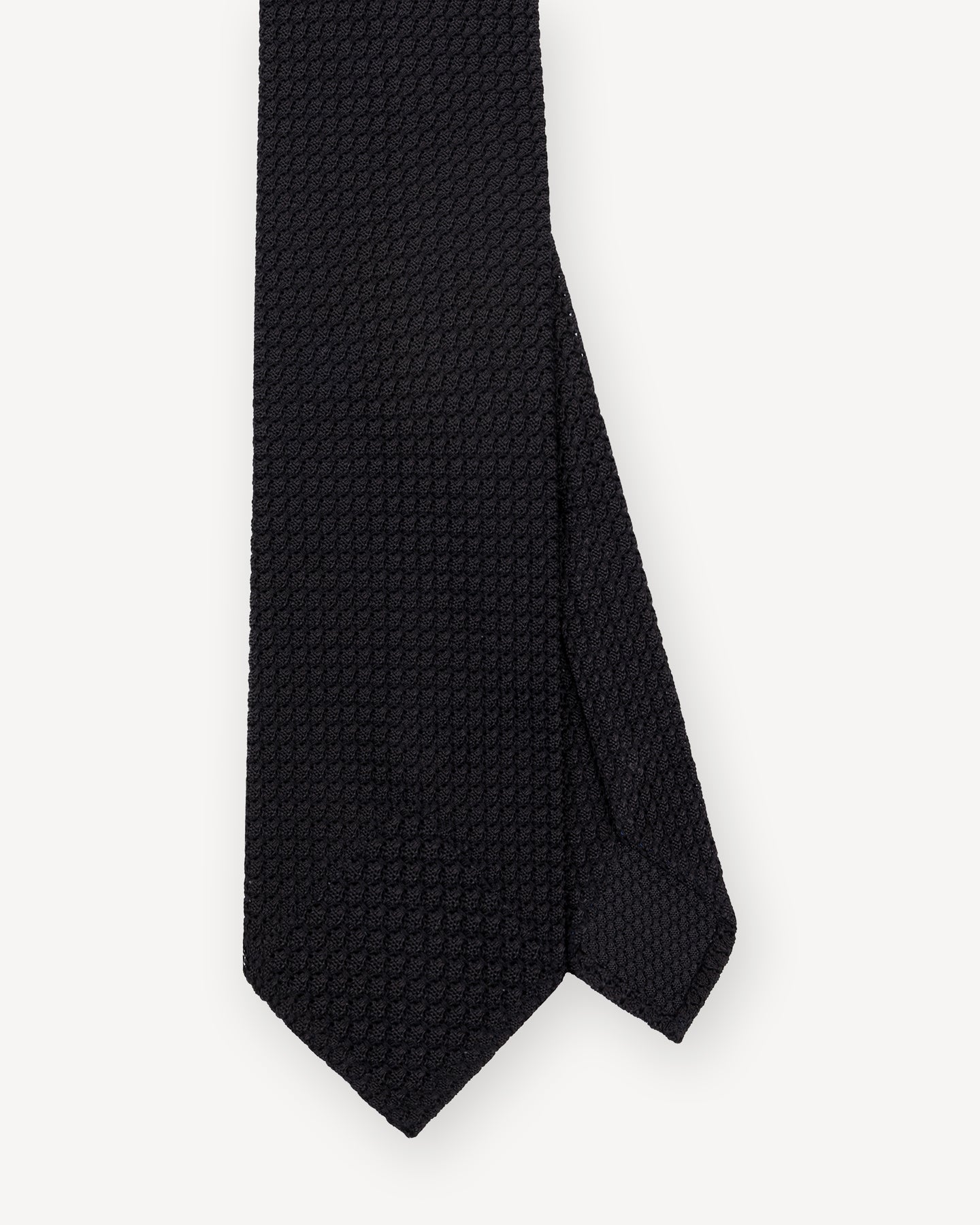 Top view of black Garza Grossa grenadine tie