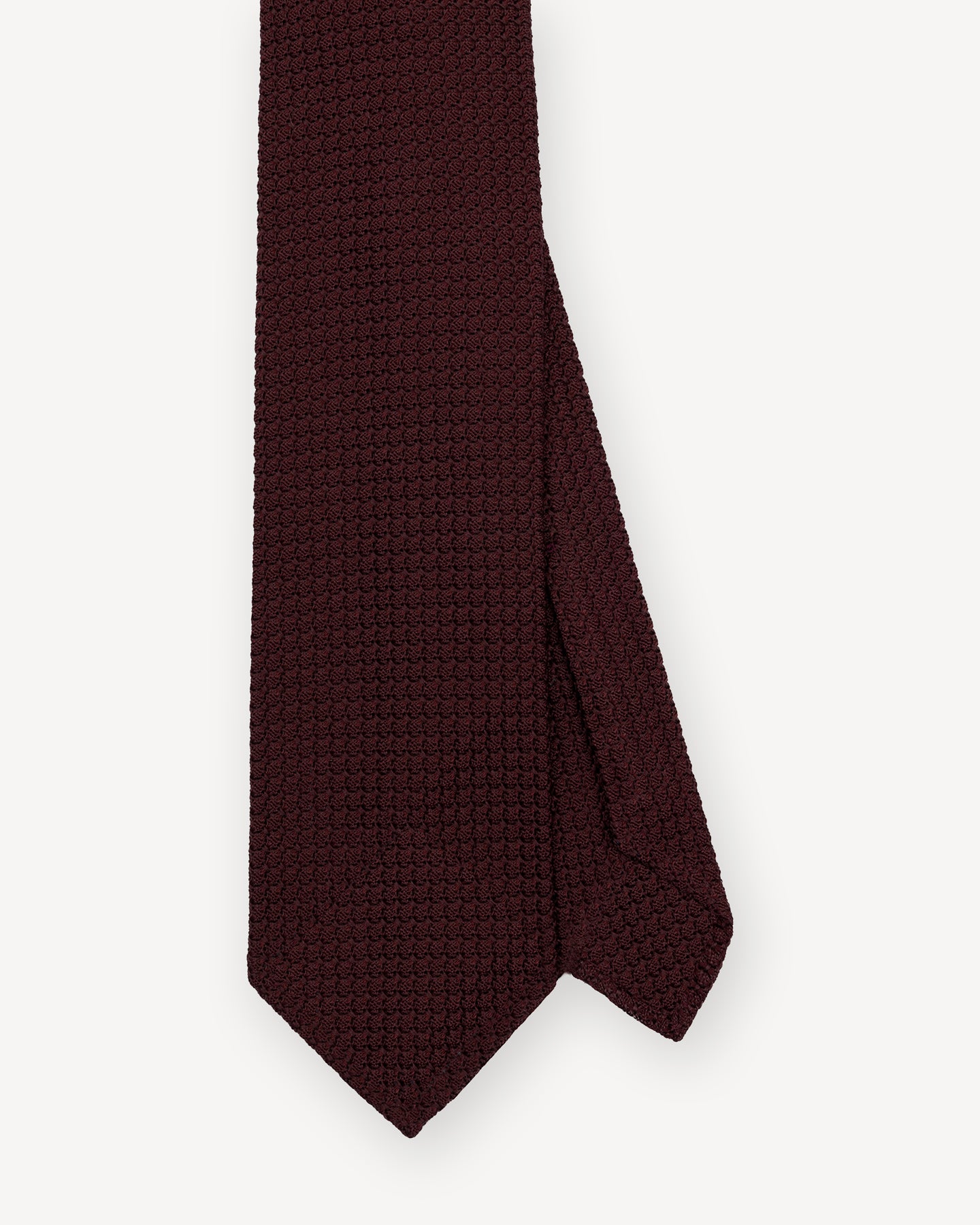 Top view of burgundy Garza Grossa grenadine tie