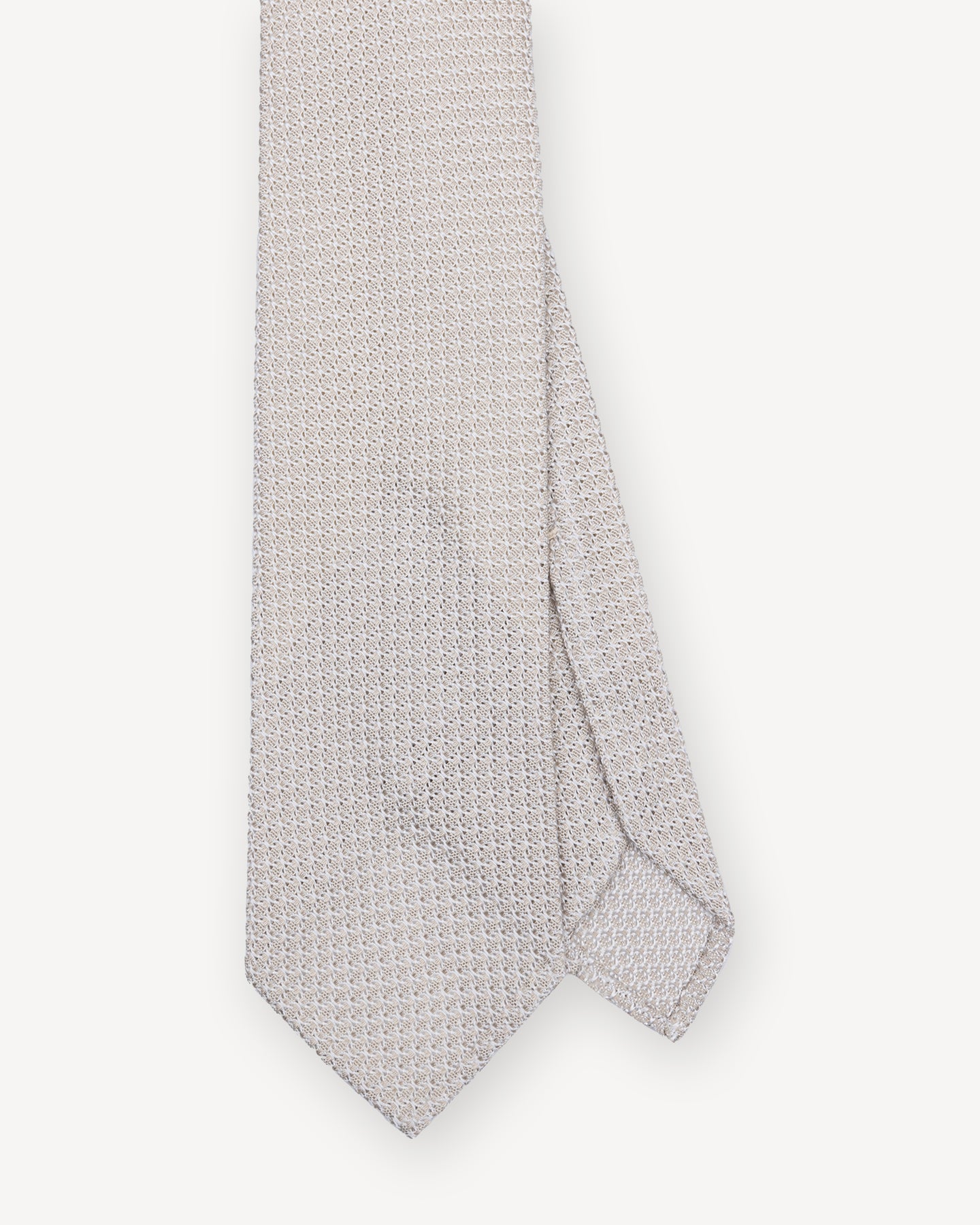 Top view of ivory Garza Grossa grenadine tie