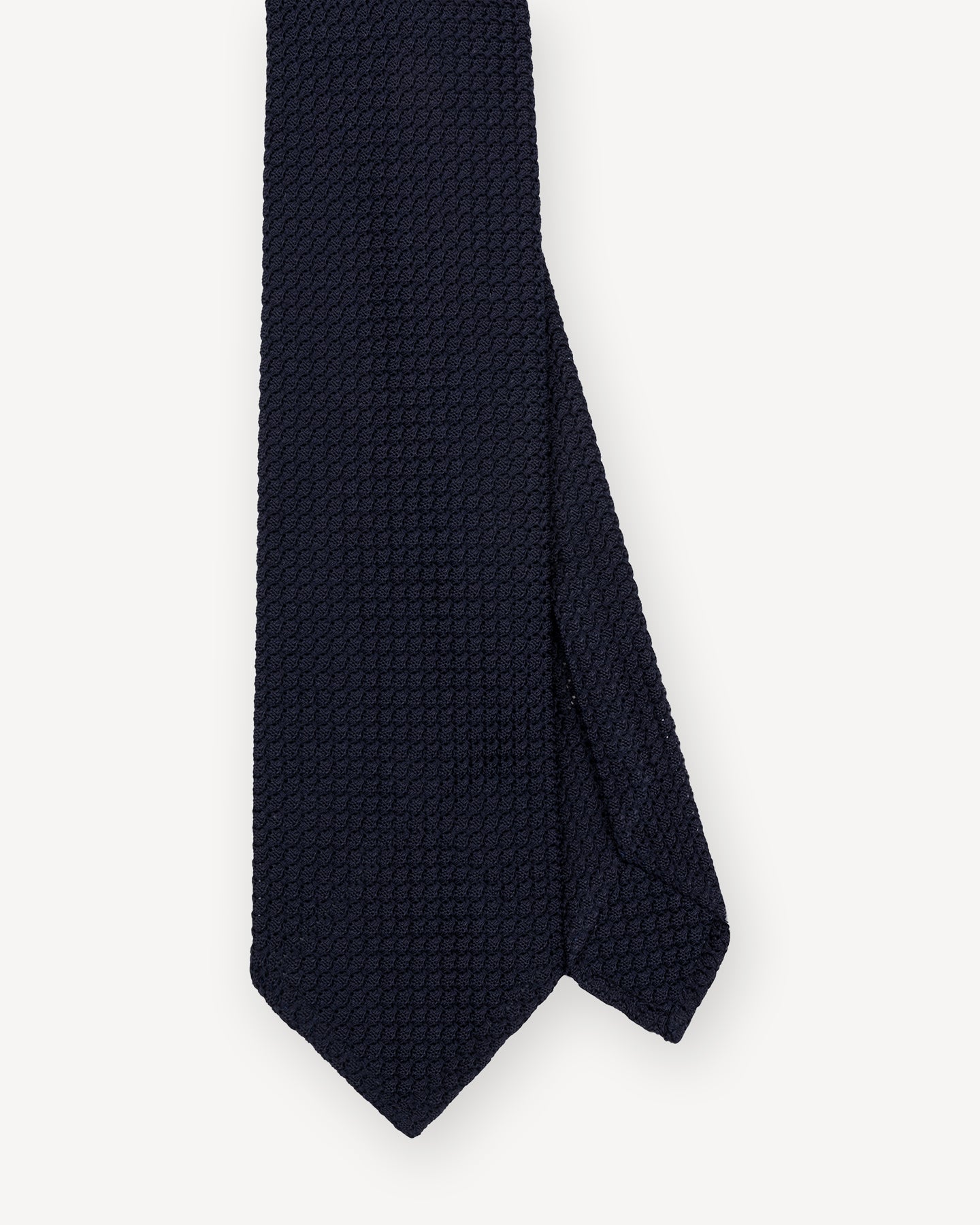 Top view of navy garza grossa grenadine tie