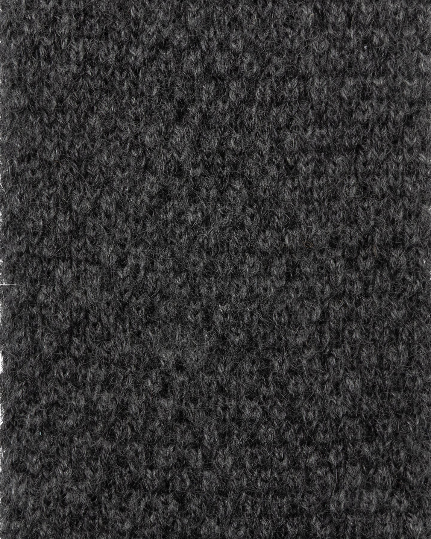 A close up of dark grey knitted cashmere