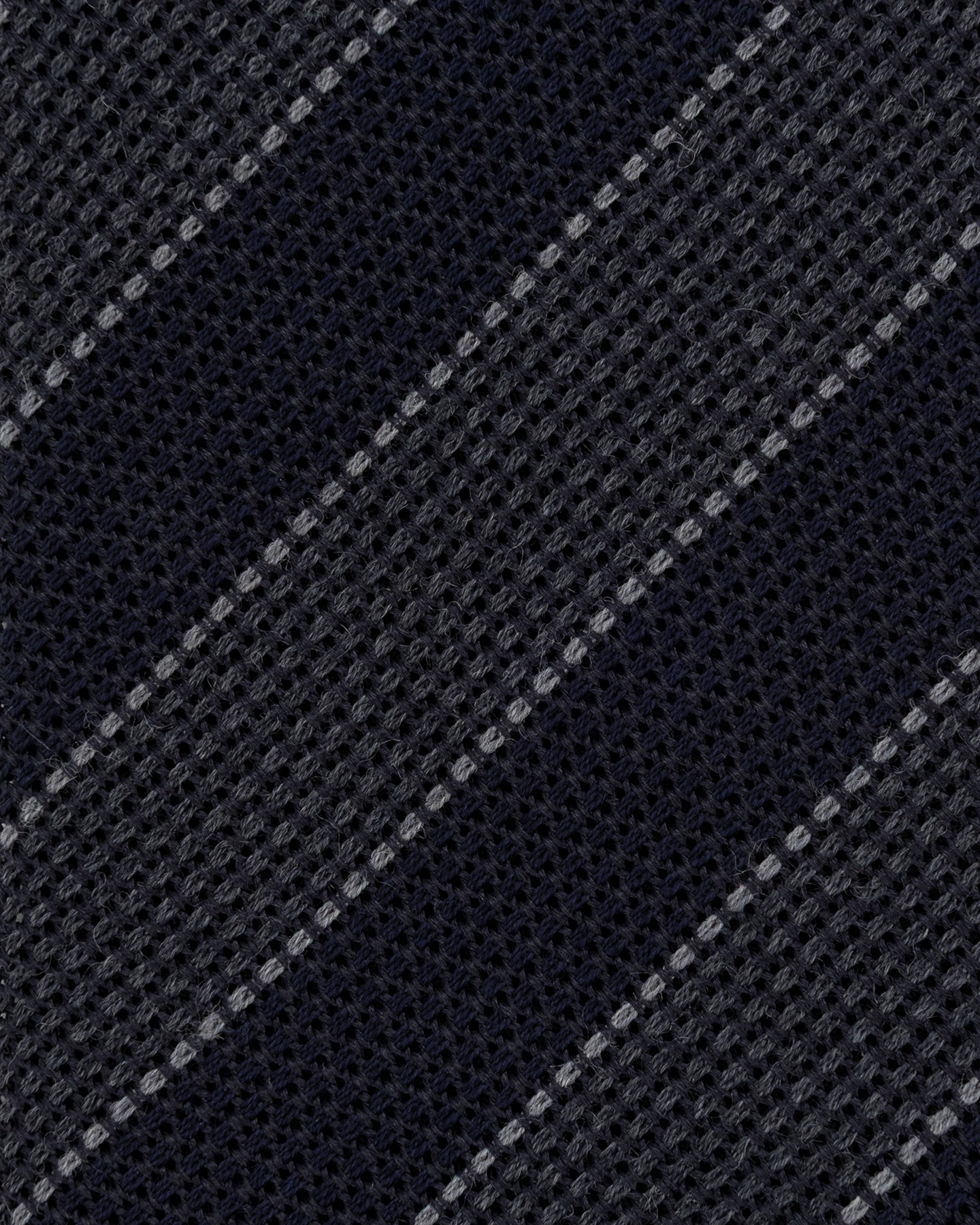 Close-up of navy and grey grenadine weave
