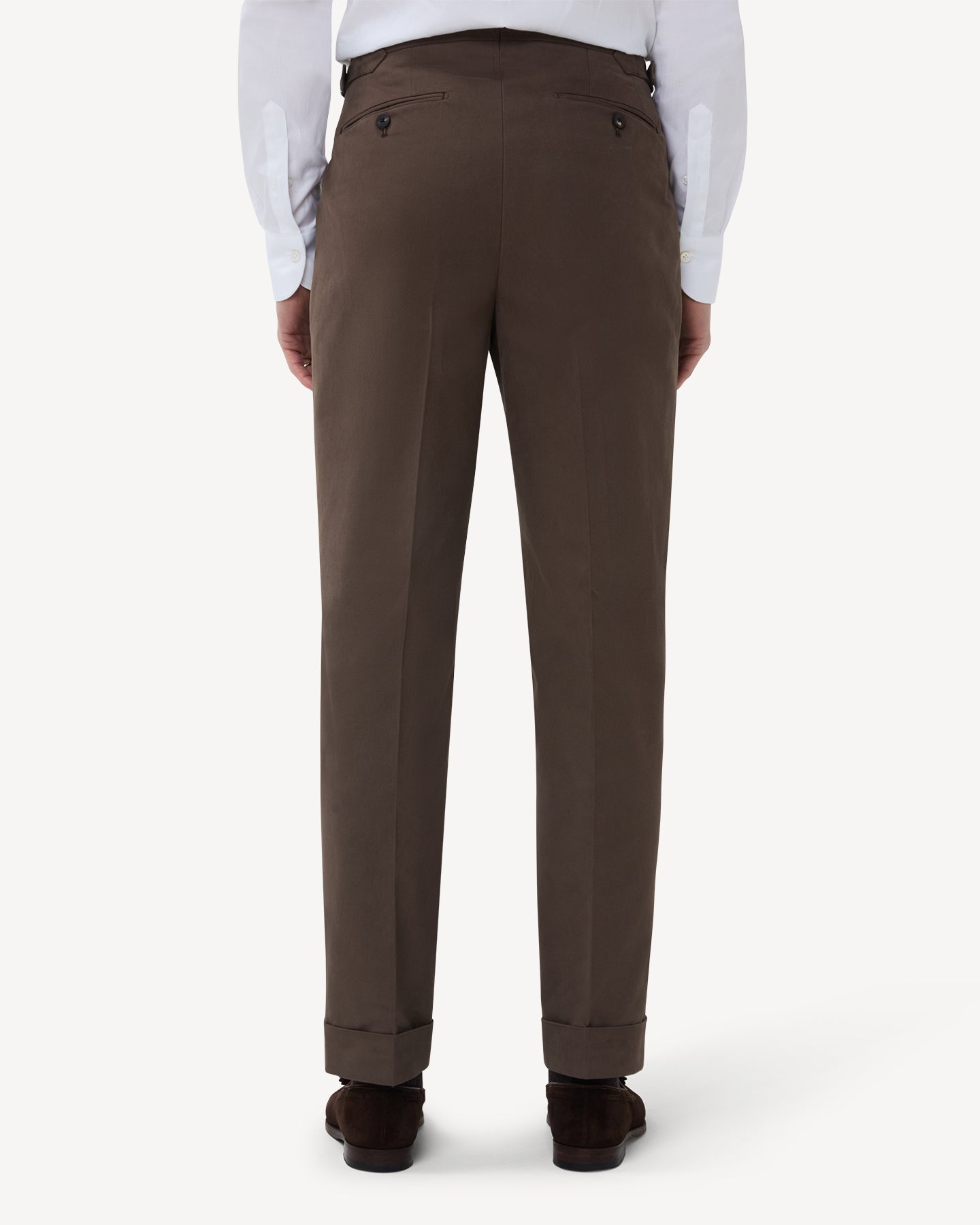 The back of tobacco cotton trousers with single pleats and side adjusters