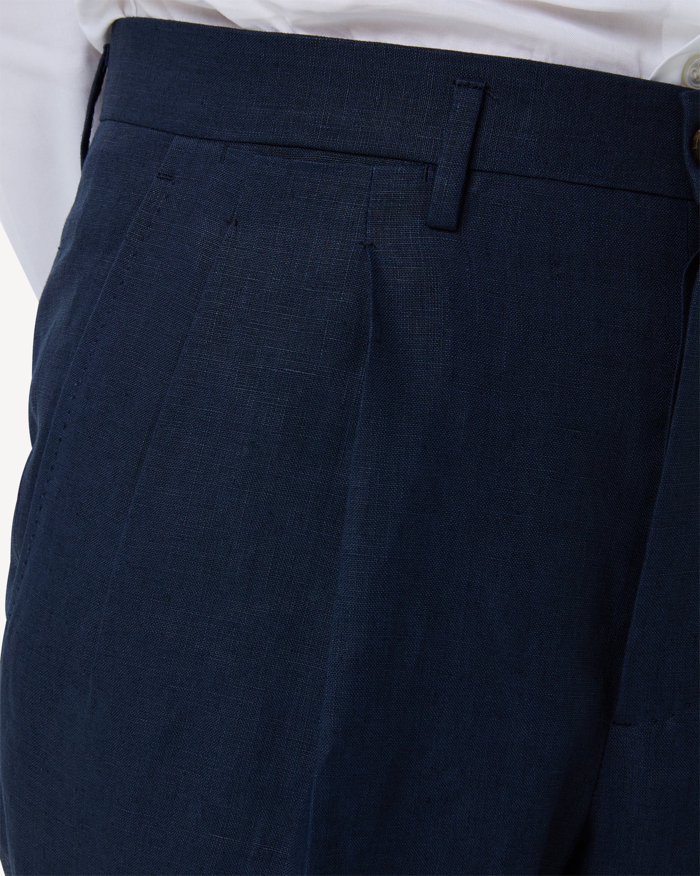 Navy linen trousers with dropped belt loop