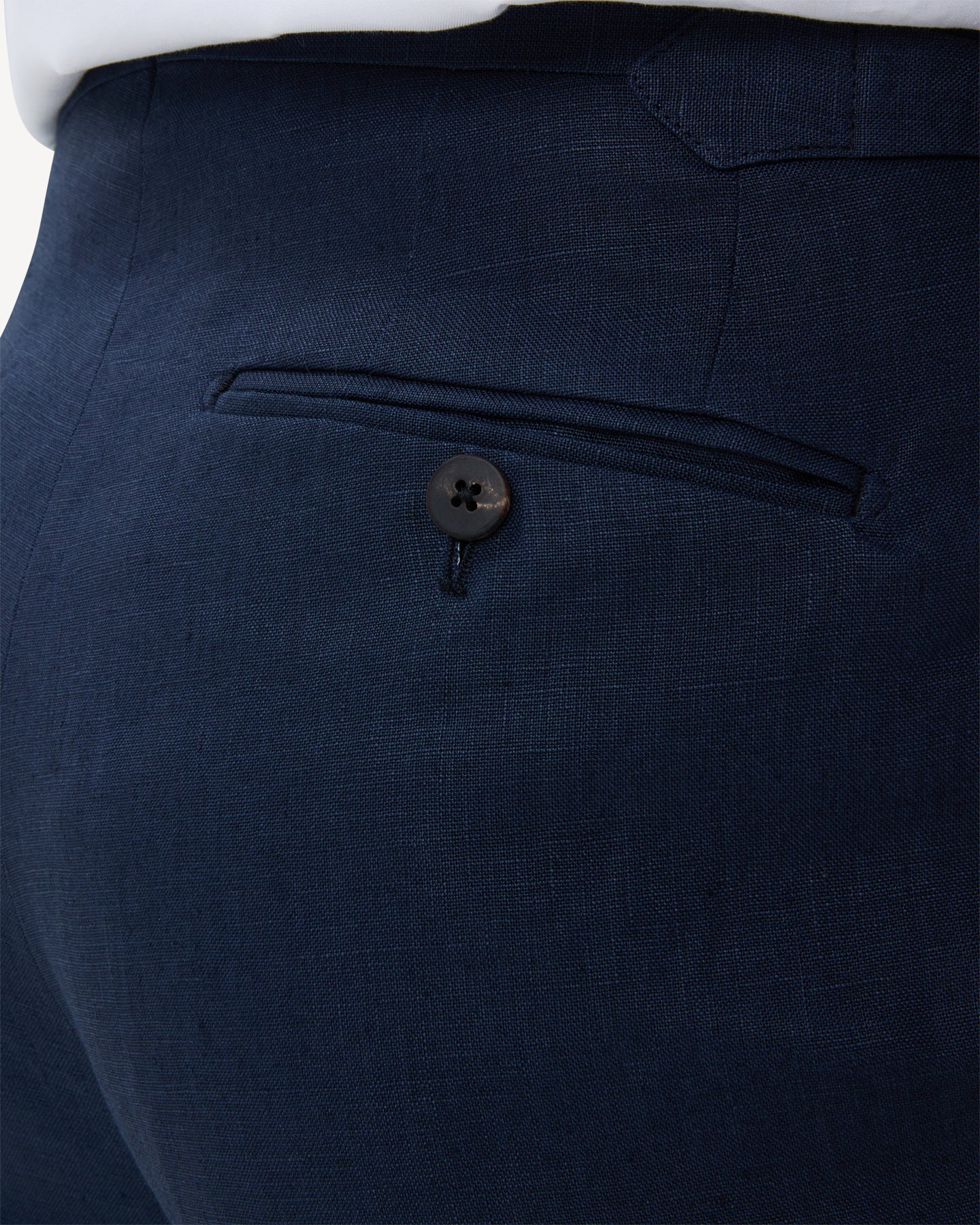Navy linen trousers with horn buttons