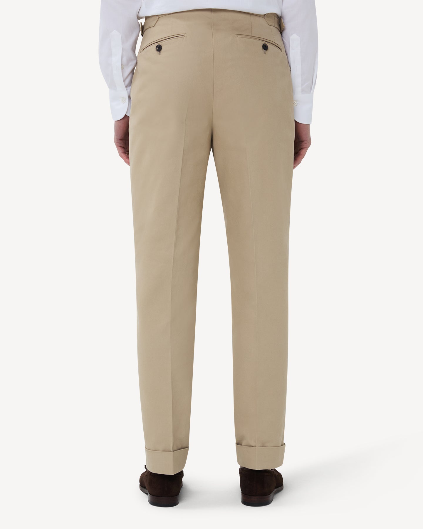 The back of stone cotton trousers with single pleats and side adjusters