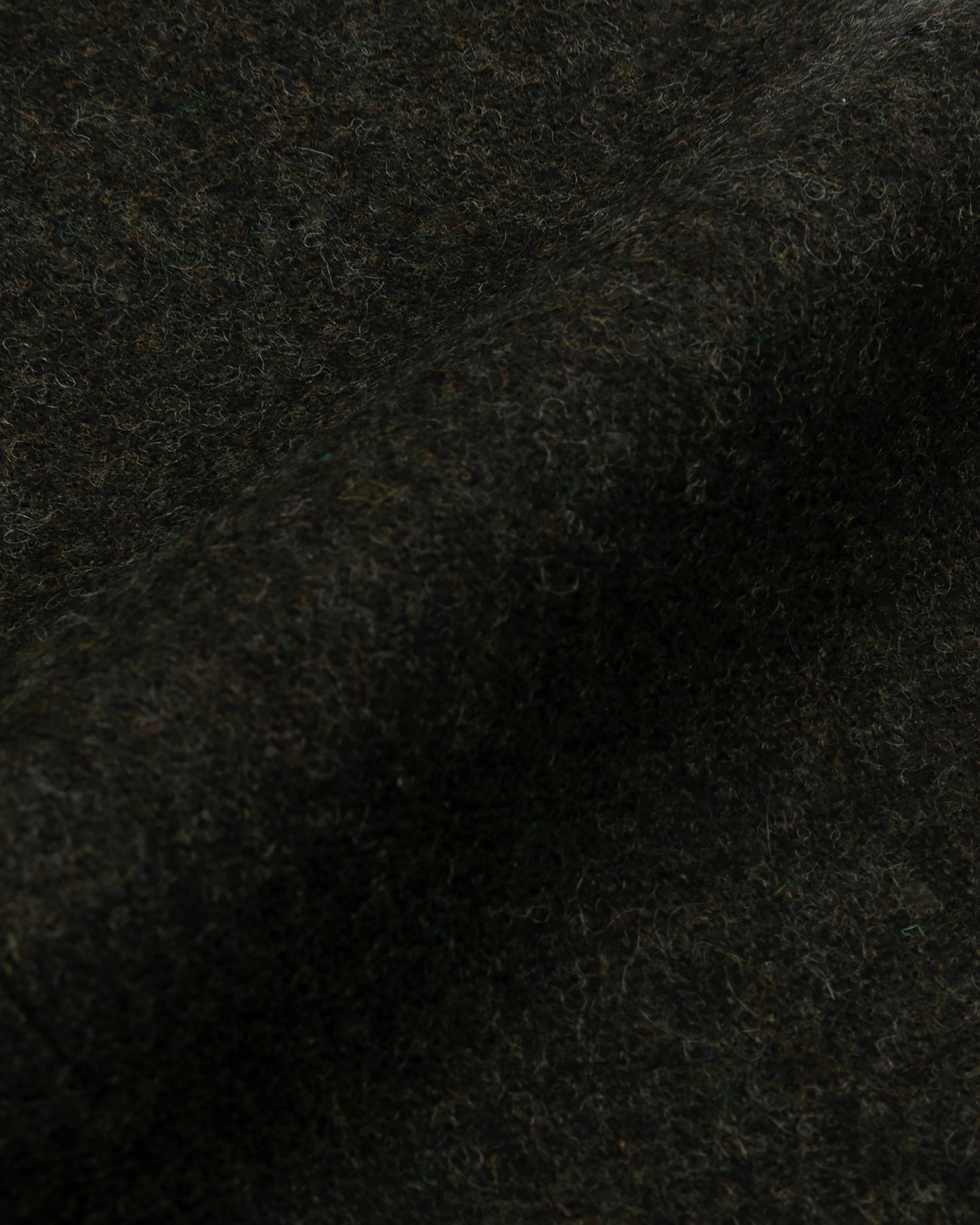 Close up of dark green flannel fabric