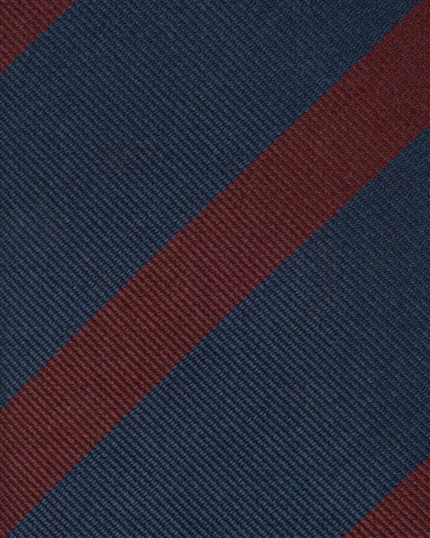 Close-up of navy and burgundy repp weave