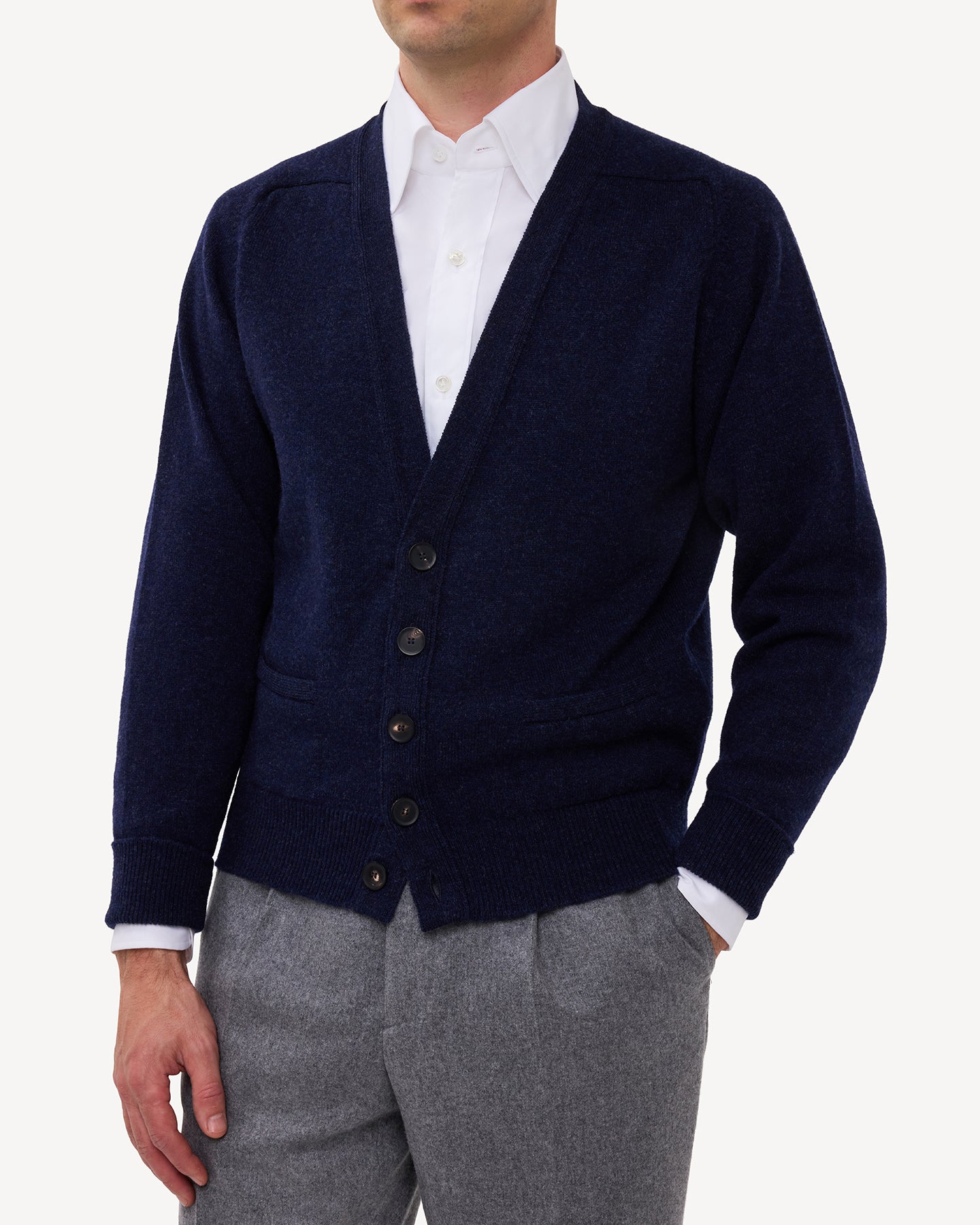 Man wearing a dark blue lambswool cardigan