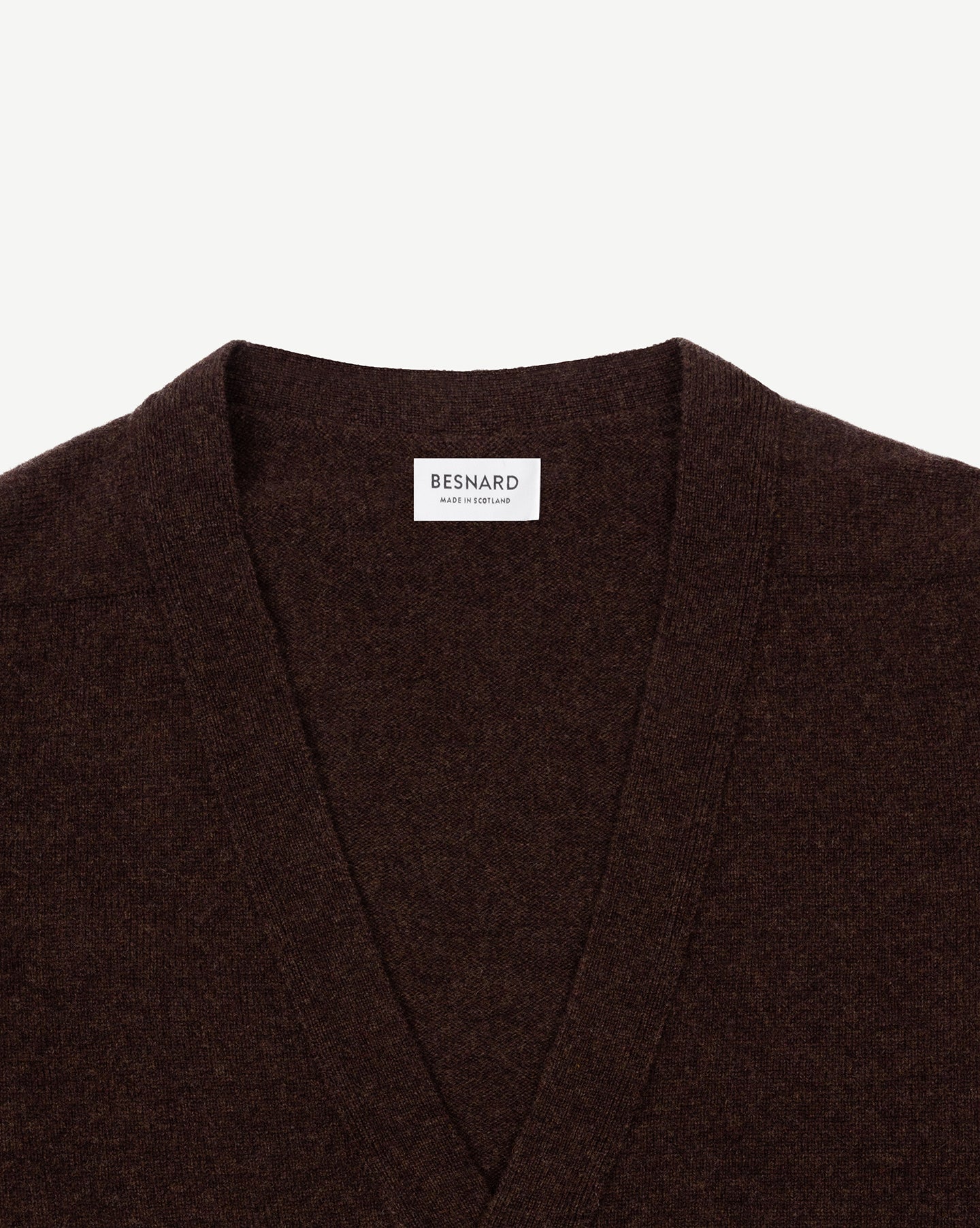 A dark brown lambswool cardigan