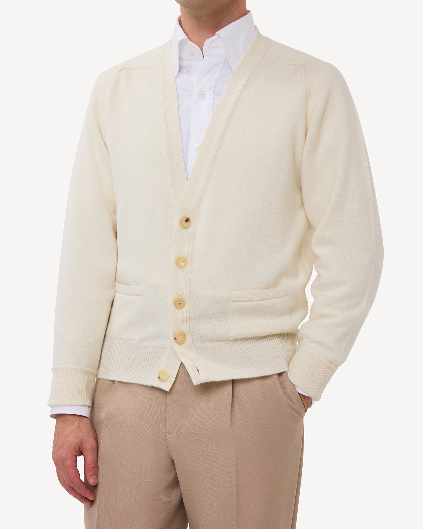 Man wearing an ecru lambswool cardigan