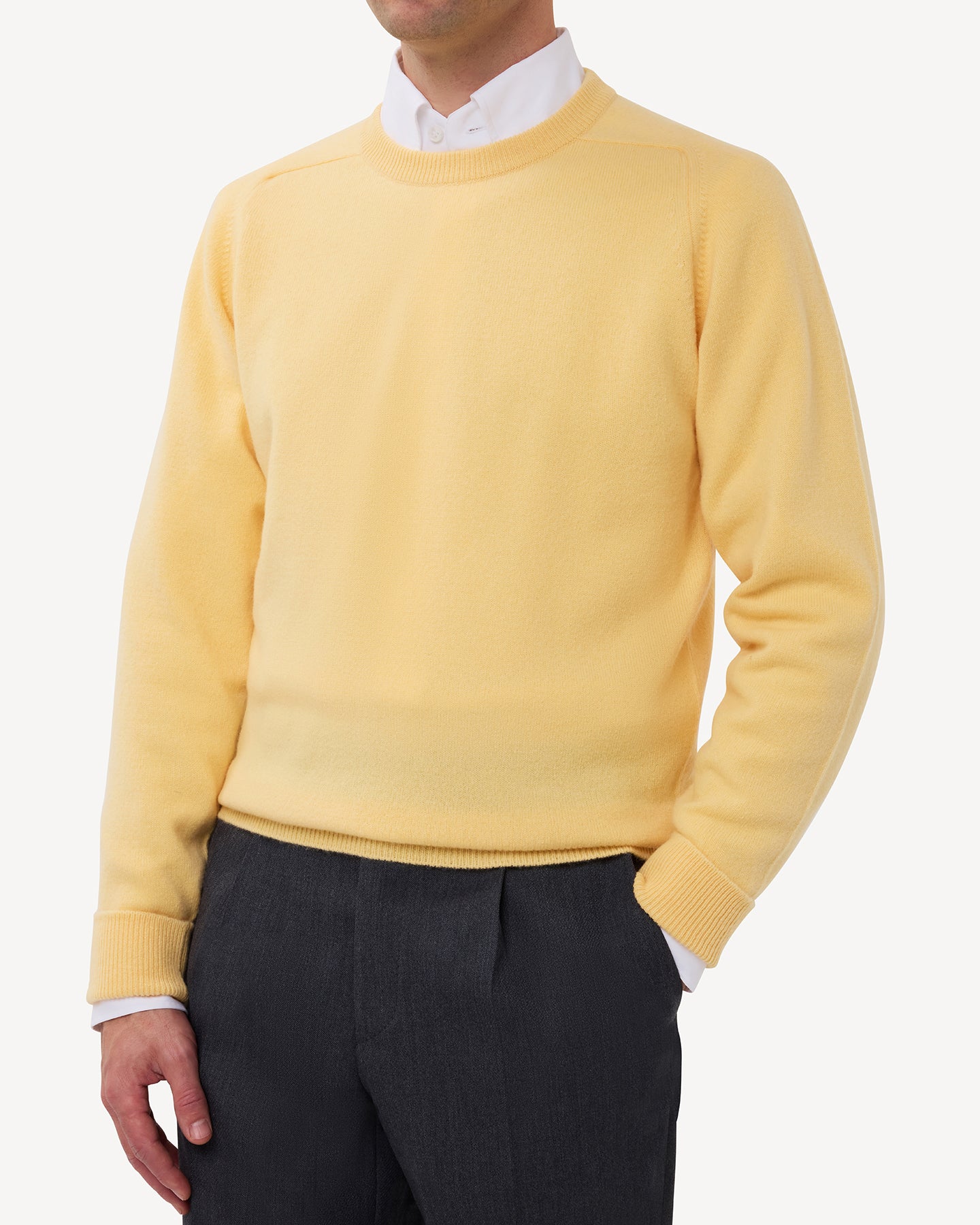 Man wearing a yellow lambswool crew neck sweater