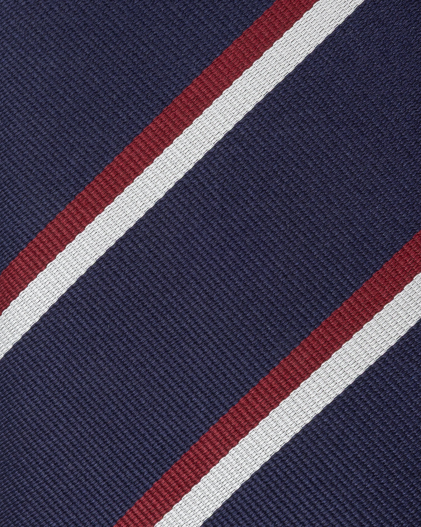 Close-up of navy, burgundy and white repp weave