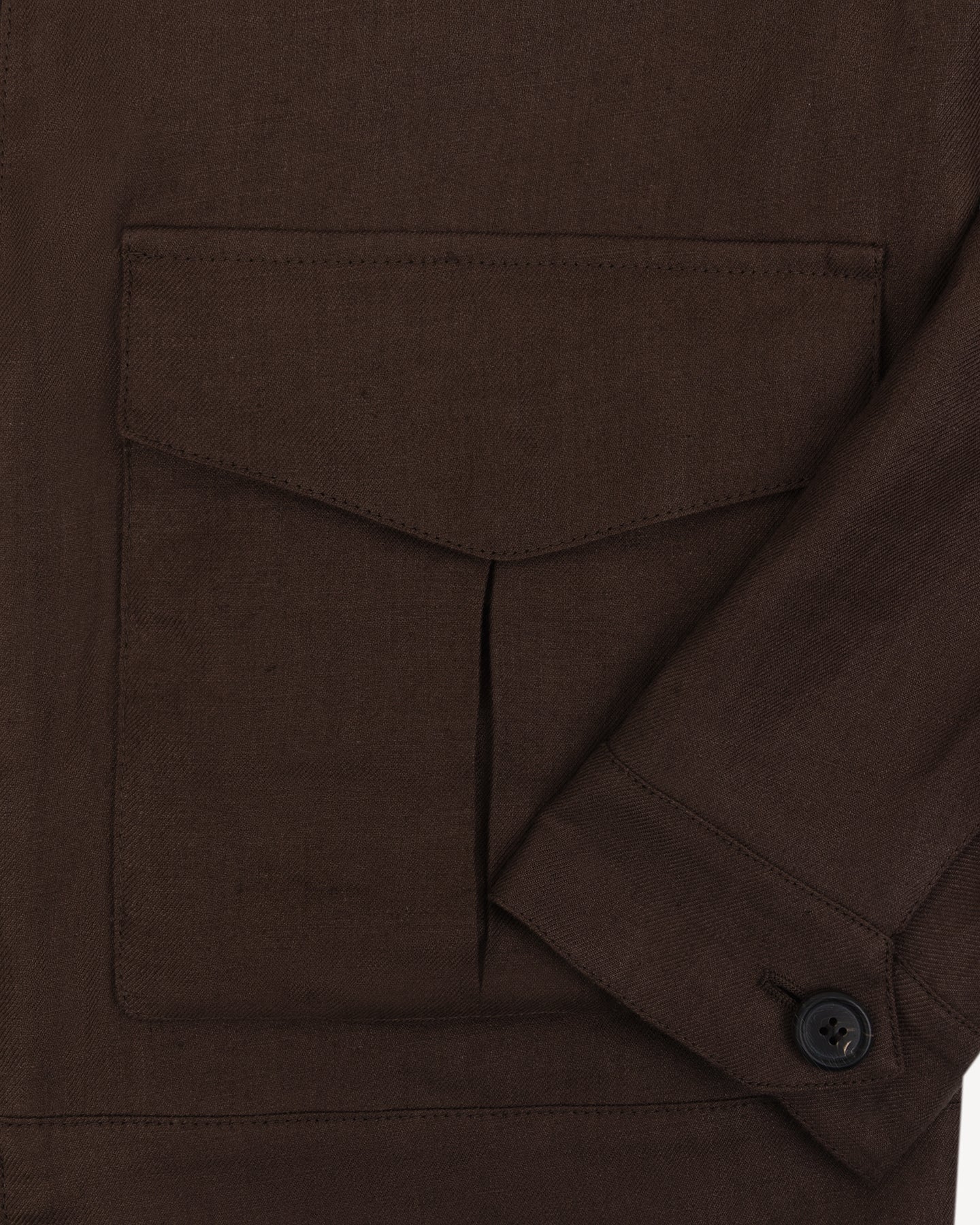 Oversized pockets on brown flight jacket