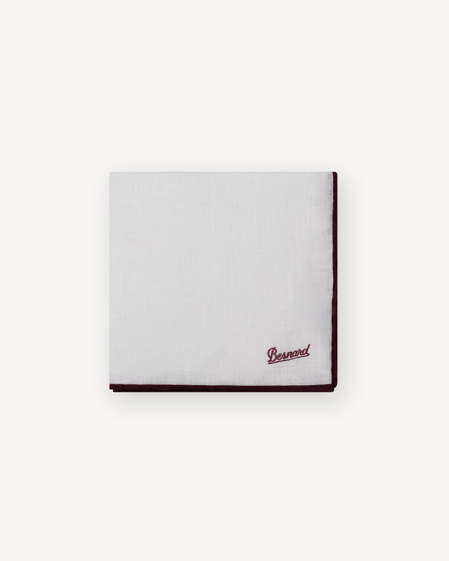 White linen pocket square with burgundy shoestring