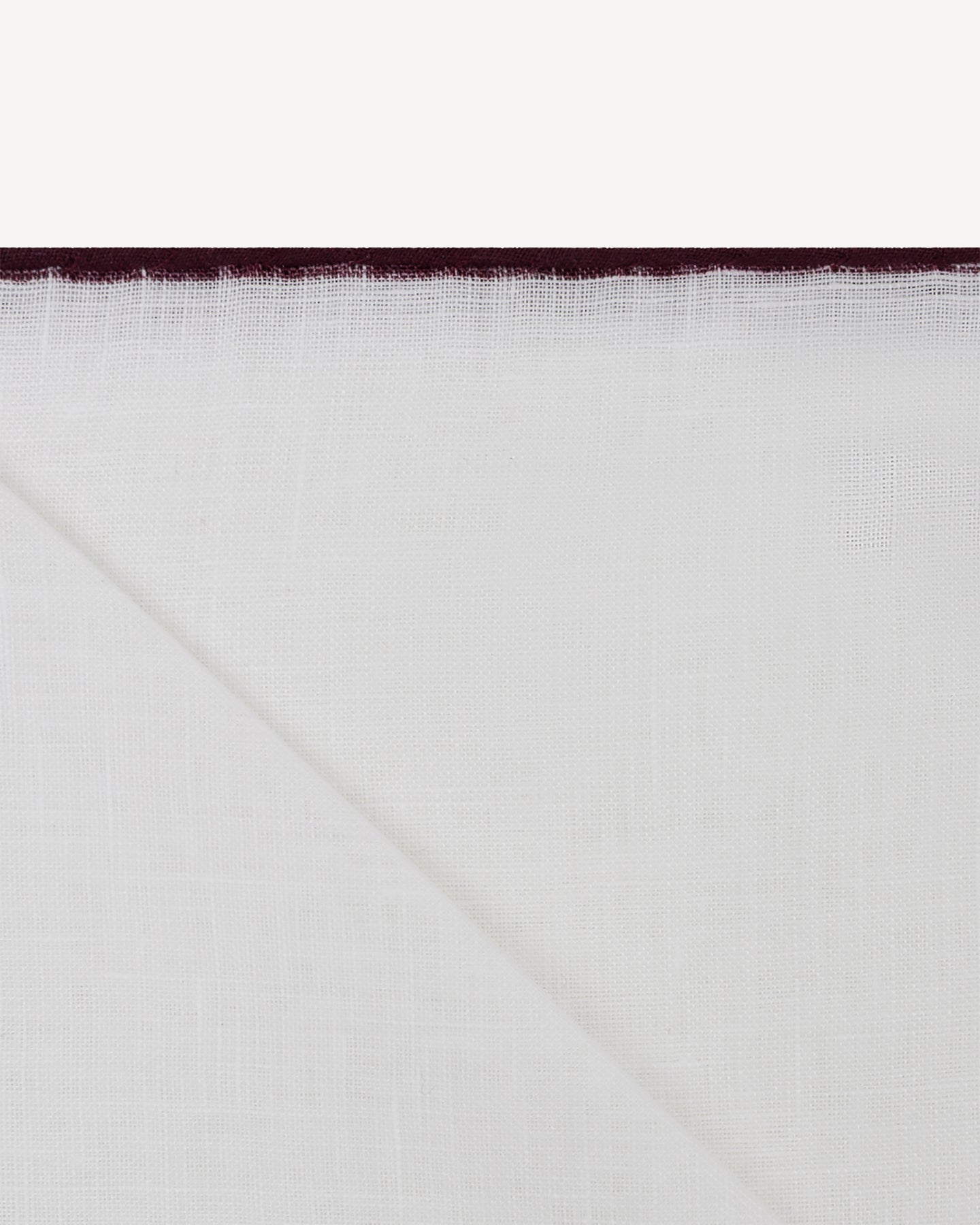 White handrolled linen pocket square with burgundy border