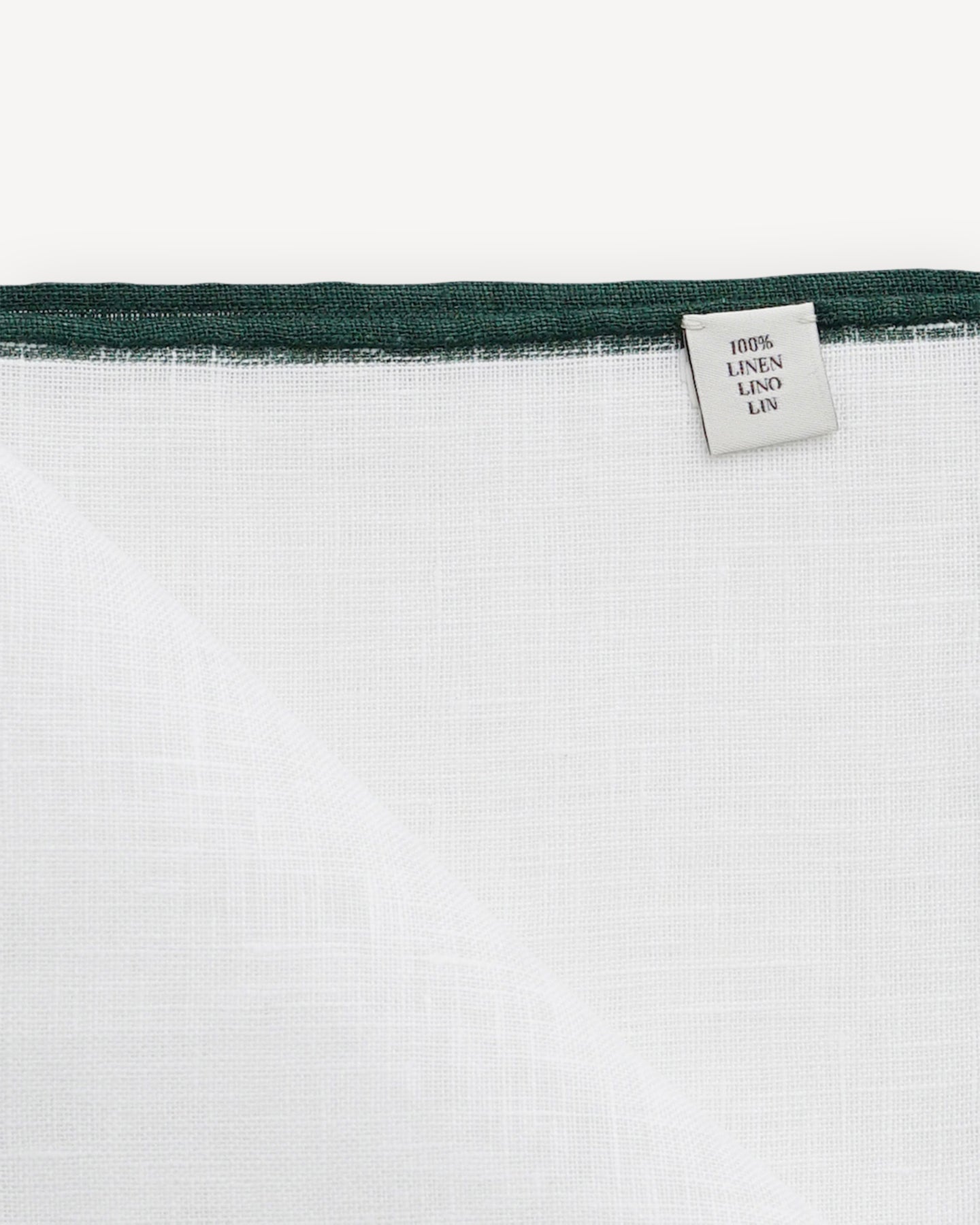 White linen pocket square with green shoestring