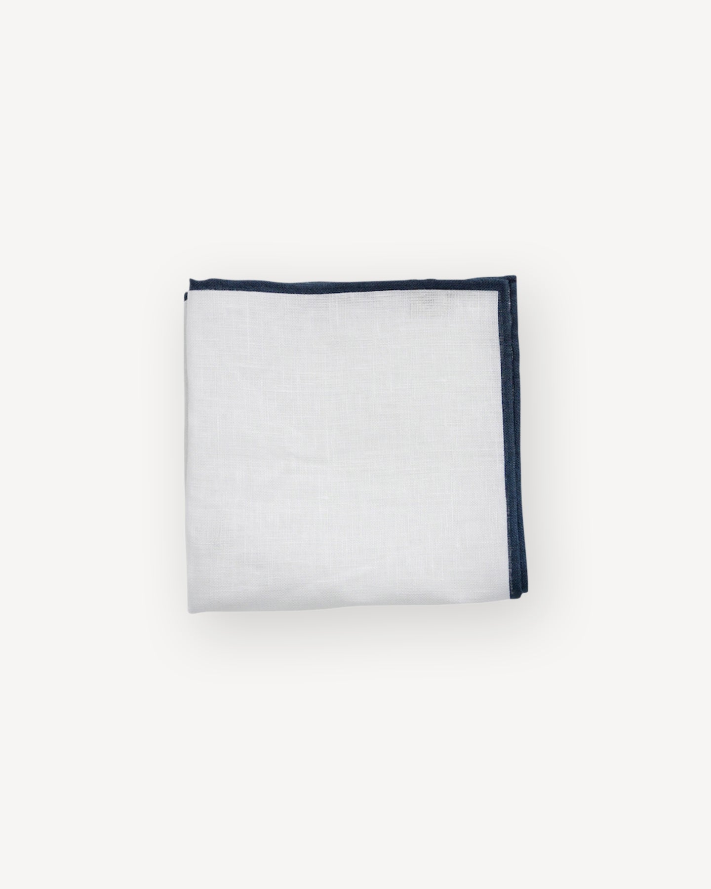 White linen pocket square with navy shoestring