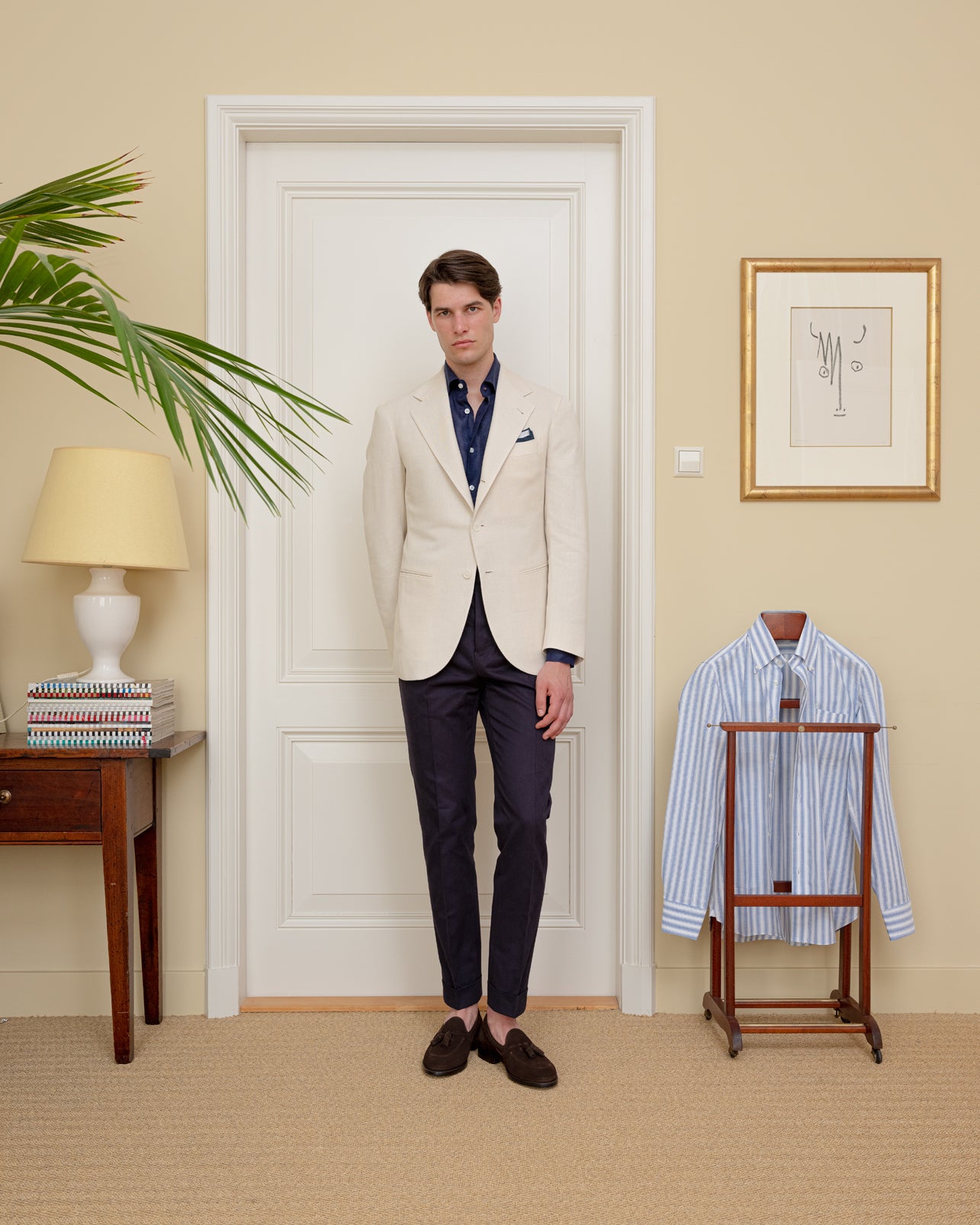 Cream silk sport coat combined with navy linen shirt and navy cotton trousers