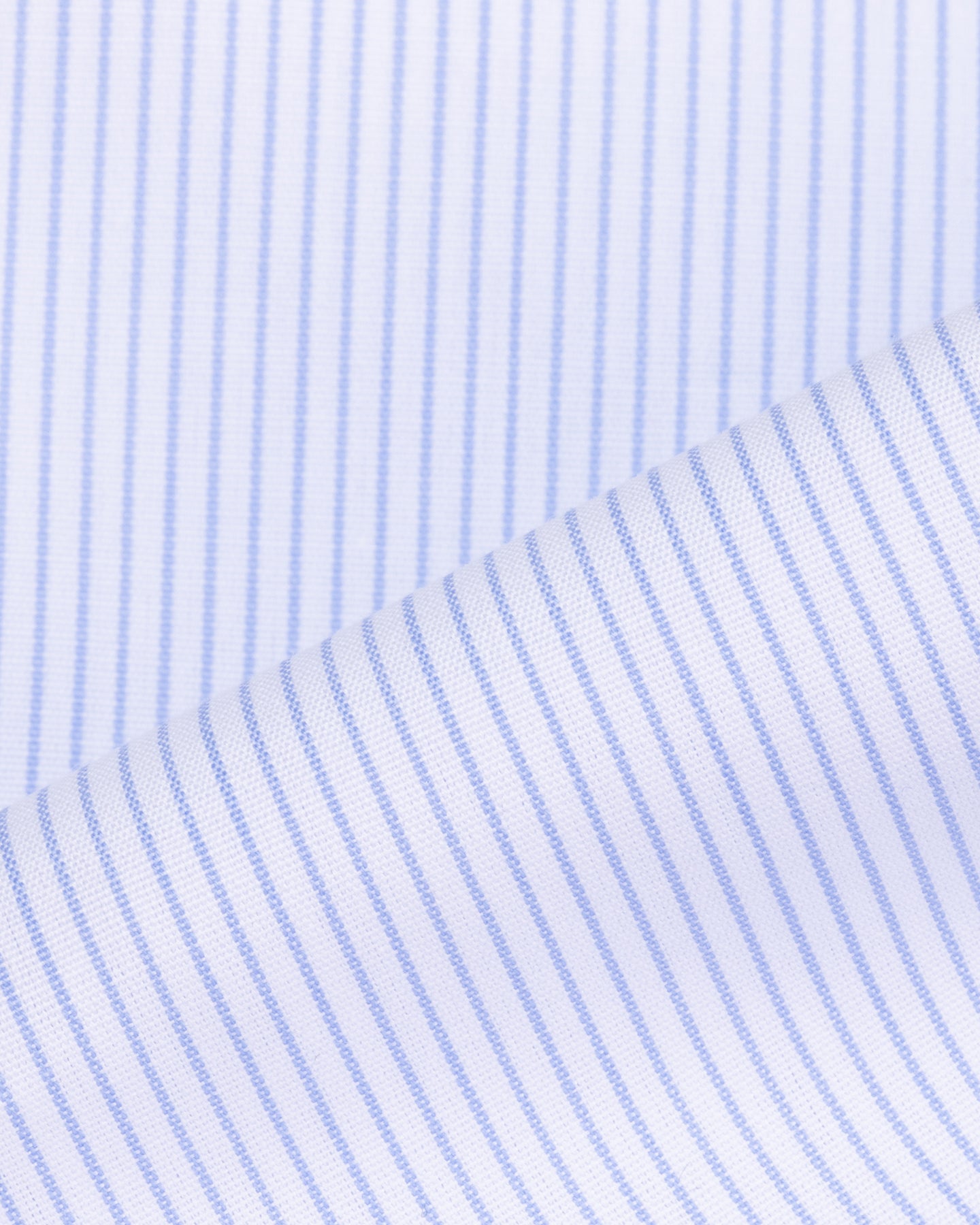 A light blue poplin shirt fabric with light blue hairline stripe