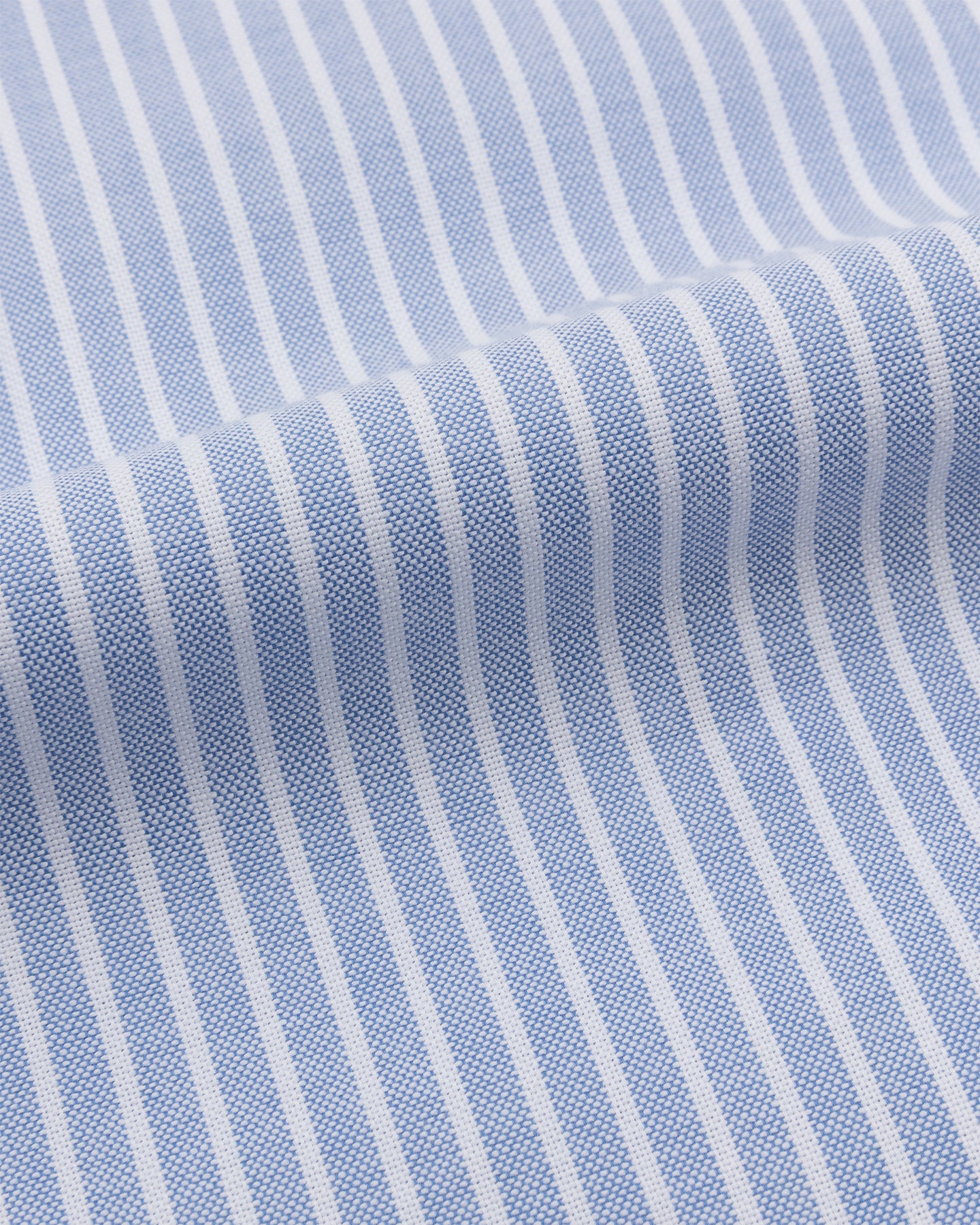 A close up of  a blue reverse stripe Oxford cloth