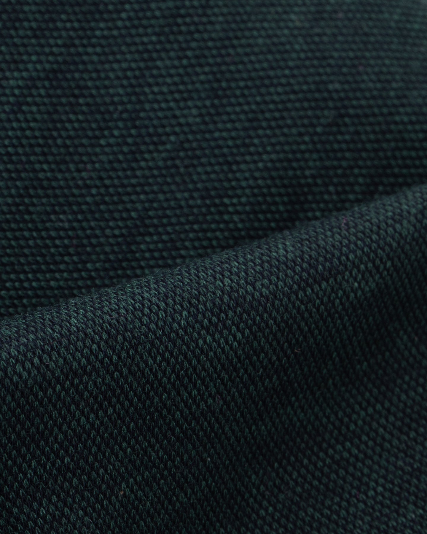 Dark green jersey piquet shirt fabric