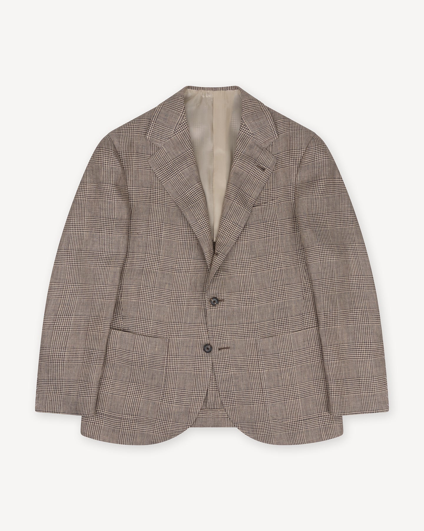 Top view of sport coat in a beige linen prince of wales fabric with dark blue and warm brown shades