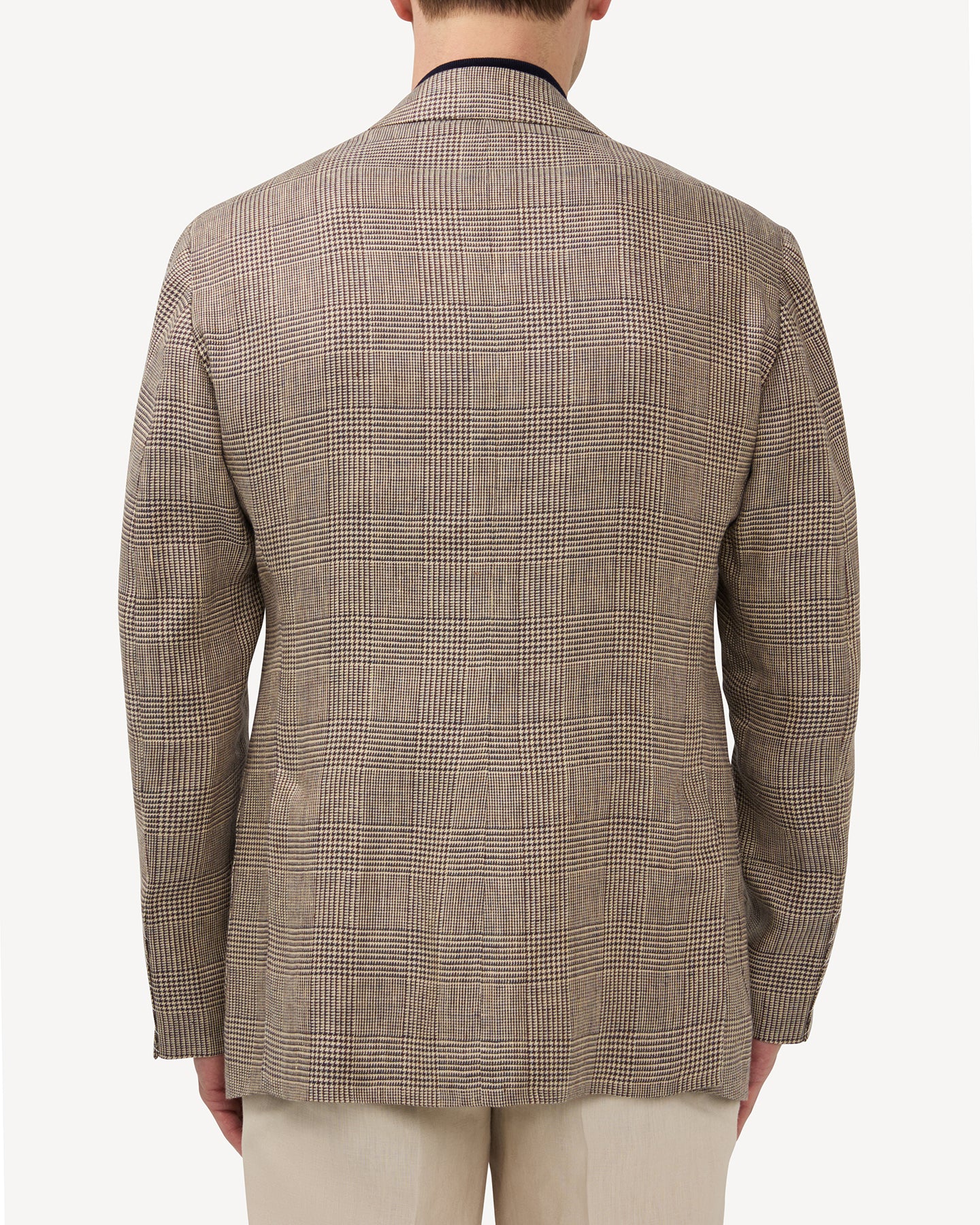 Back view of a brown linen Prince of Wales sport coat