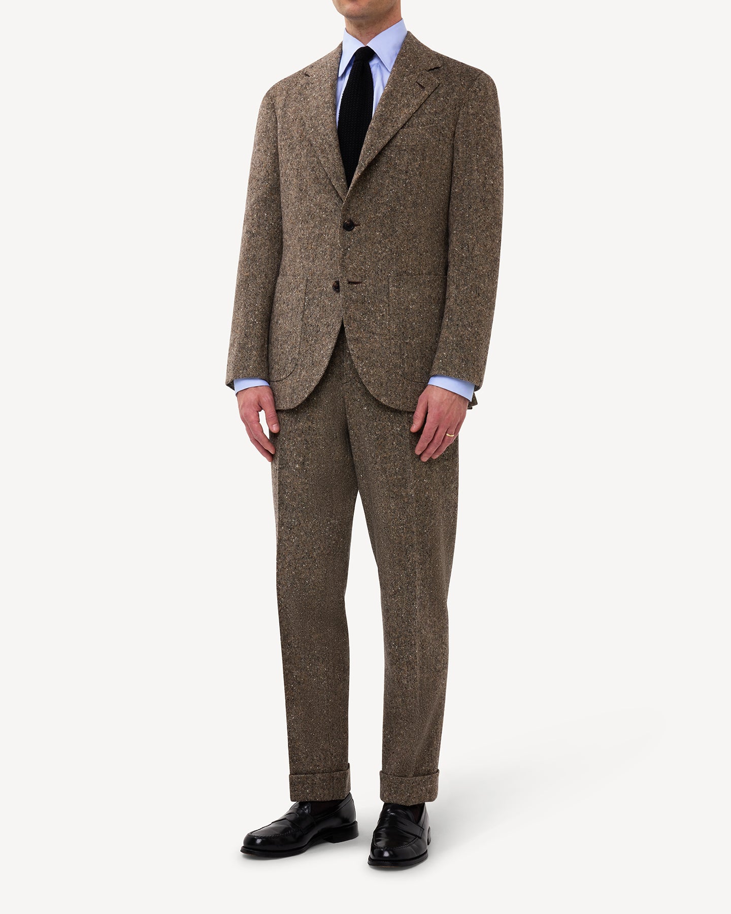 A man wearing a Light Brown Donegal Tweed Suit