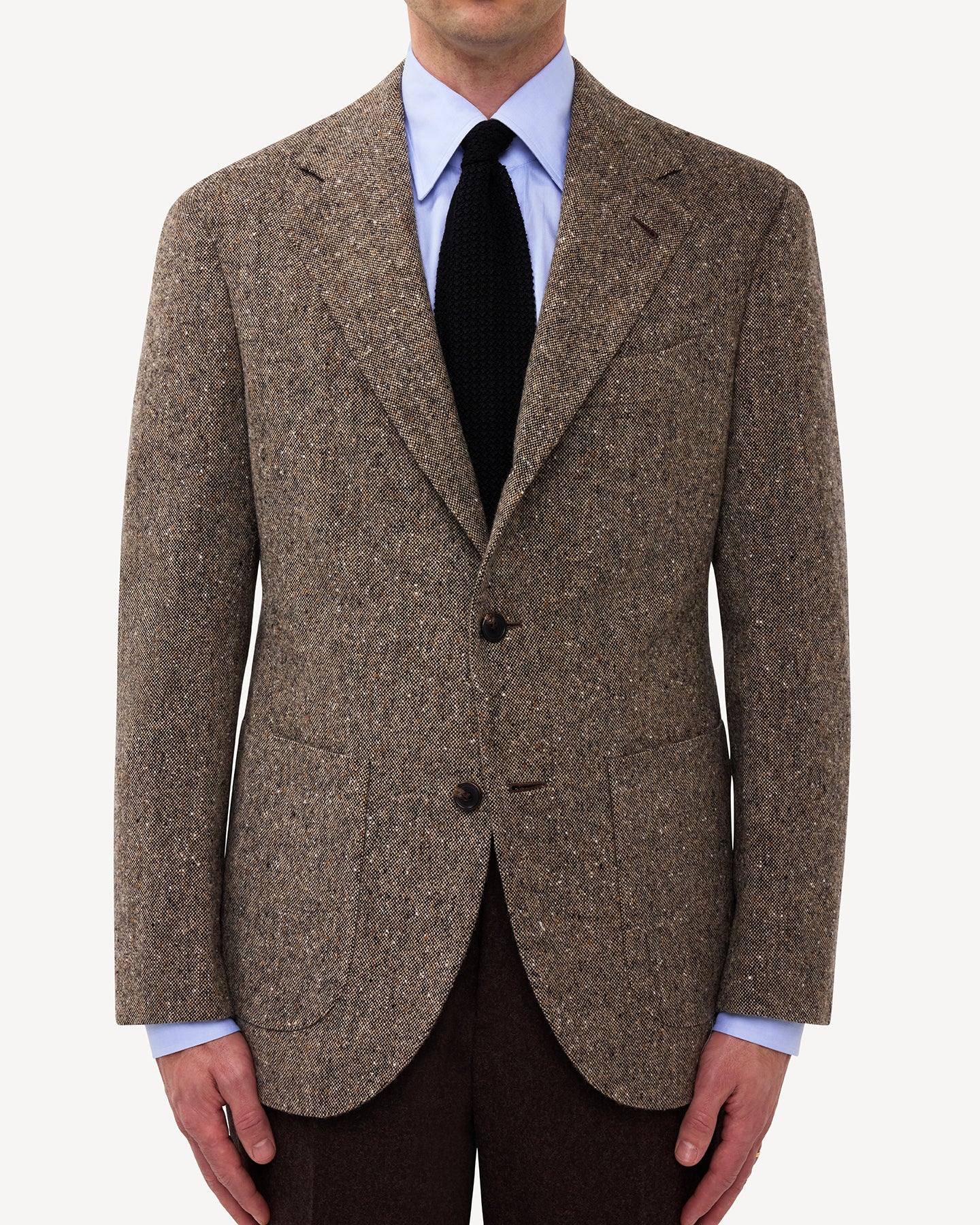 Man wearing a Light Brown Donegal Tweed Sport Coat with knitted tie