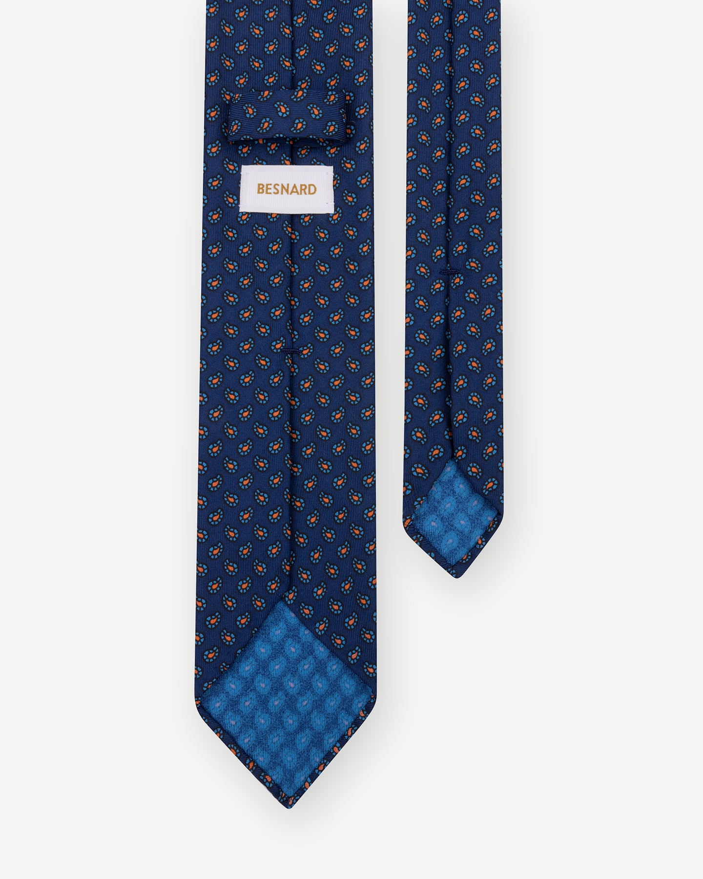 Dark blue Ancient Madder tie with small paisley pattern with handrolled blades