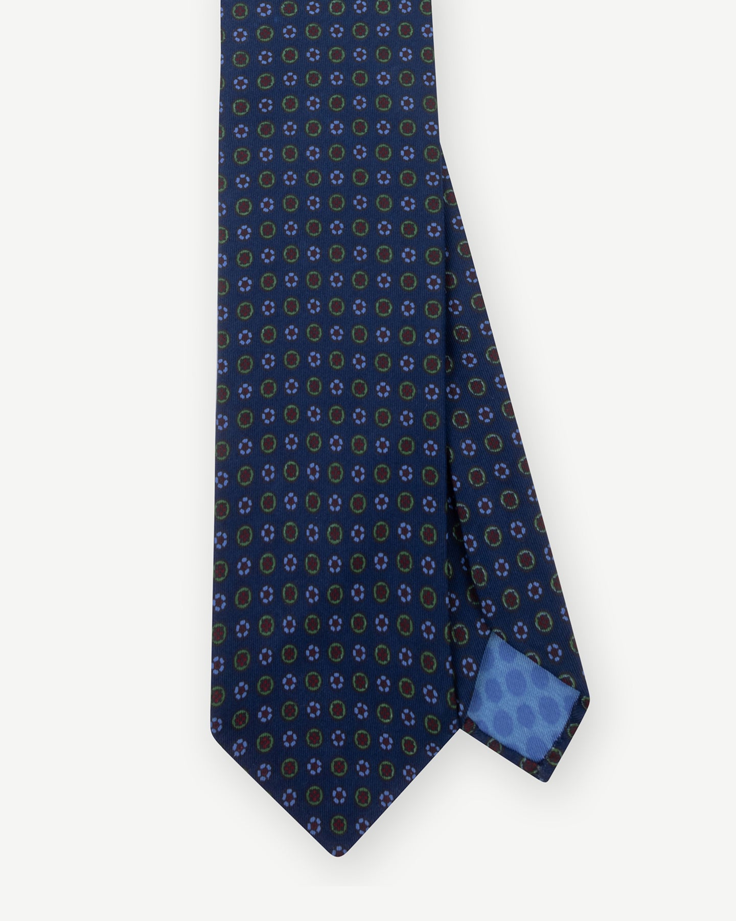 Dark blue Ancient Madder tie with small floral pattern