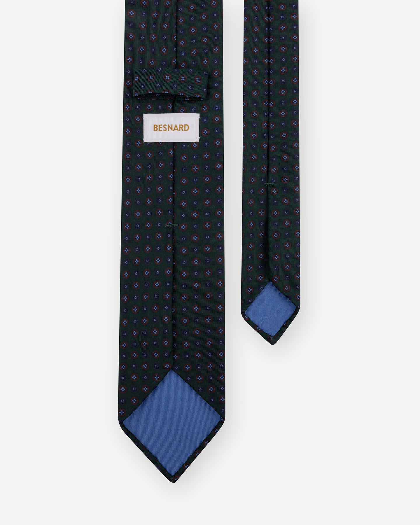 Dark green Ancient Madder tie with small floral pattern and handrolled blades