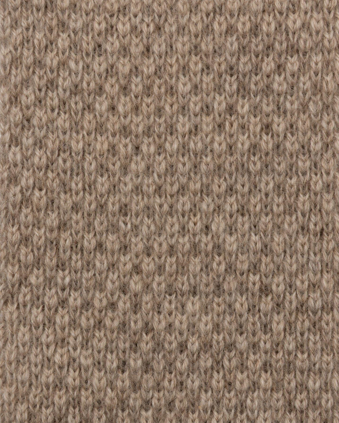 A close up of  beige knitted cashmere
