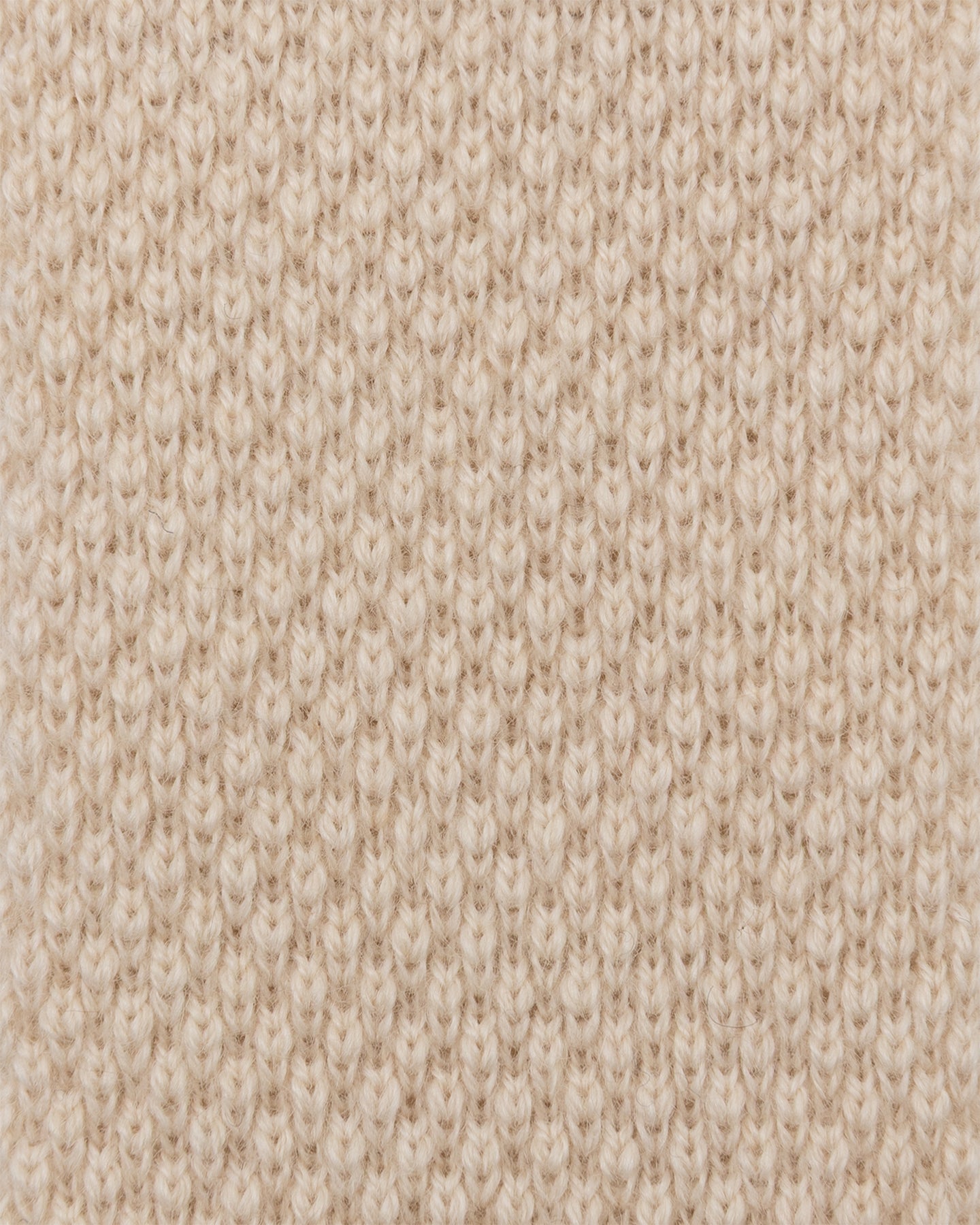 A close up of oatmeal knitted cashmere