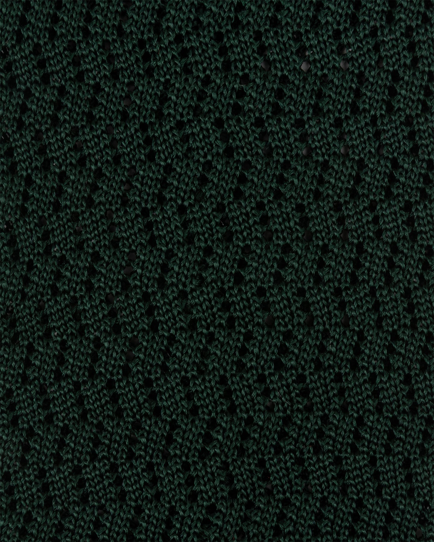 Close-up of dark green zigzag knitted tie